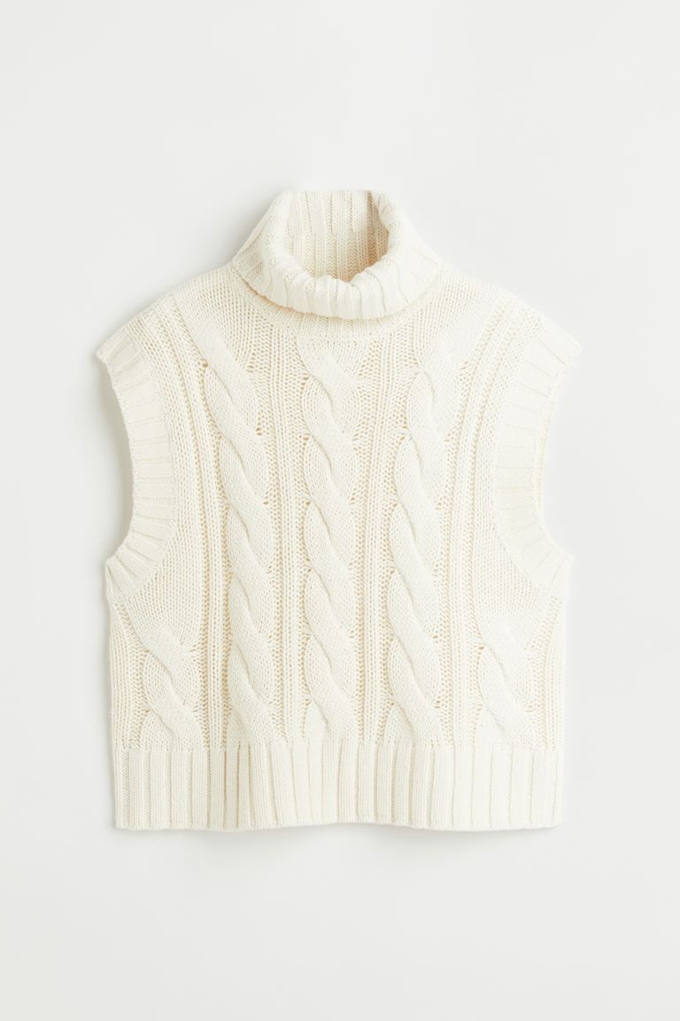 Soft, cable-knit sweater vest with a ribbed turtleneck. | H&M (US + CA)