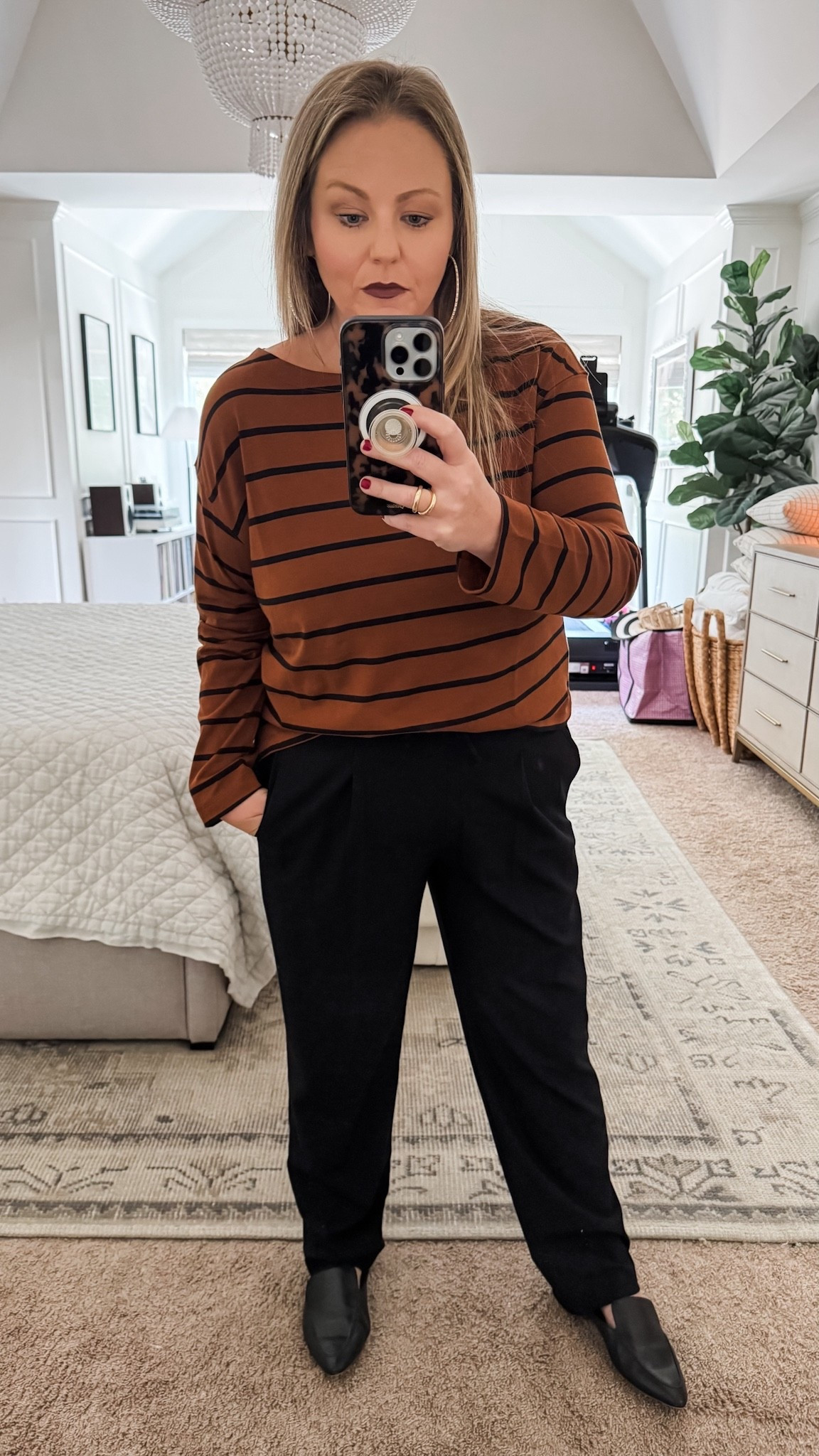 I love the shorter length of these straight leg black trousers and they’ll never go out of style. They pair perfectly with these brown striped shirt that’s available in lots of different colors. work outfit fall outfit black pants date night outfit 

#LTKFindsUnder50 #LTKBeauty #LTKSaleAlert