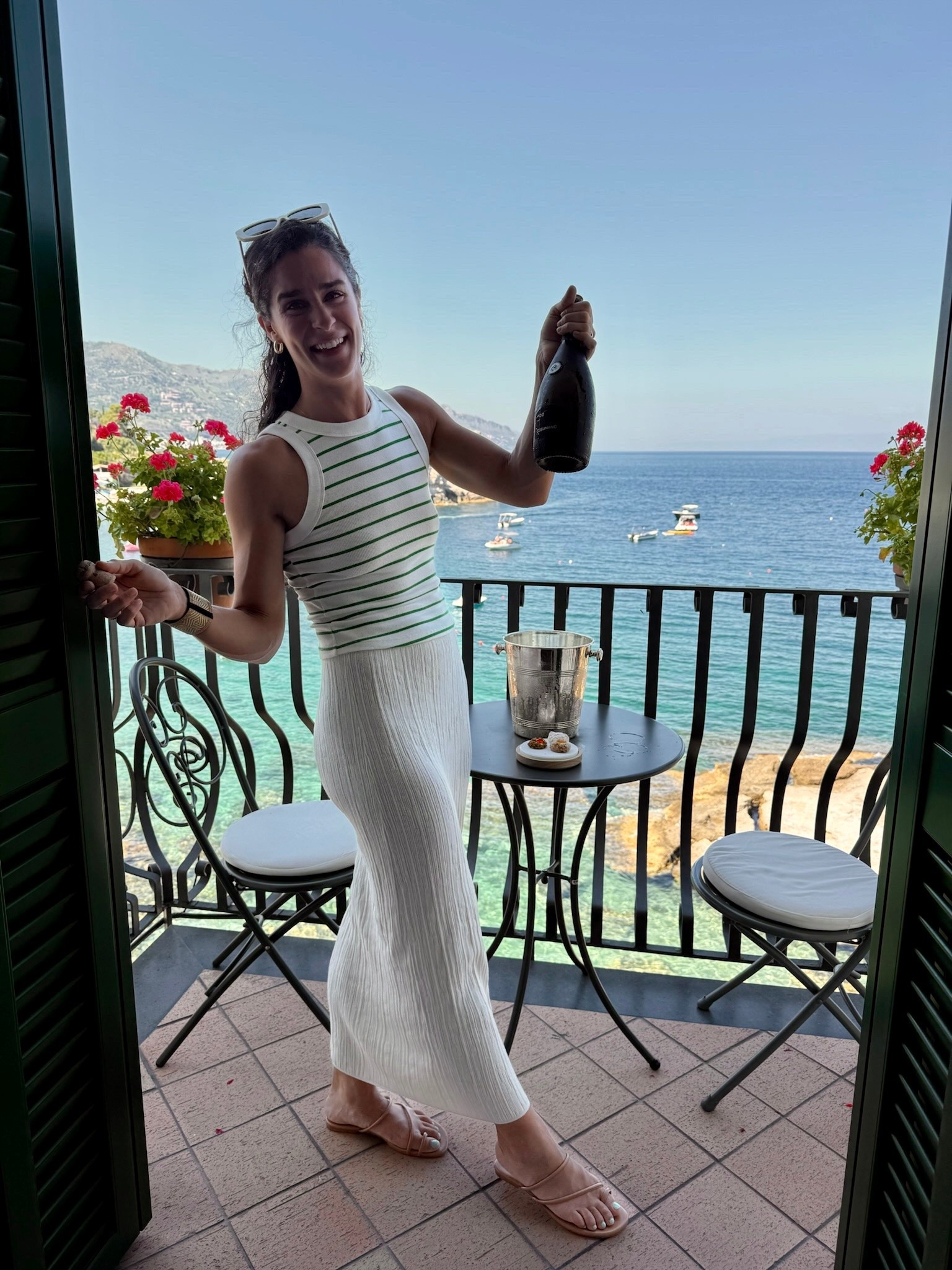 Love this staple tank. It goes with everything 

This skirt is extremely comfortable and flattering. Runs TTS- wearing a small. It is not lined so definitely need nude underwear.

My shoes are comfortable and also go with everything. Wear the Amazon version here. I also have the reformation version in black. 
Love both! I think Amazon fit is better if your foot is a little wider. Reformation better for a narrower foot. Both run TTS. Wearing a 9 in both 