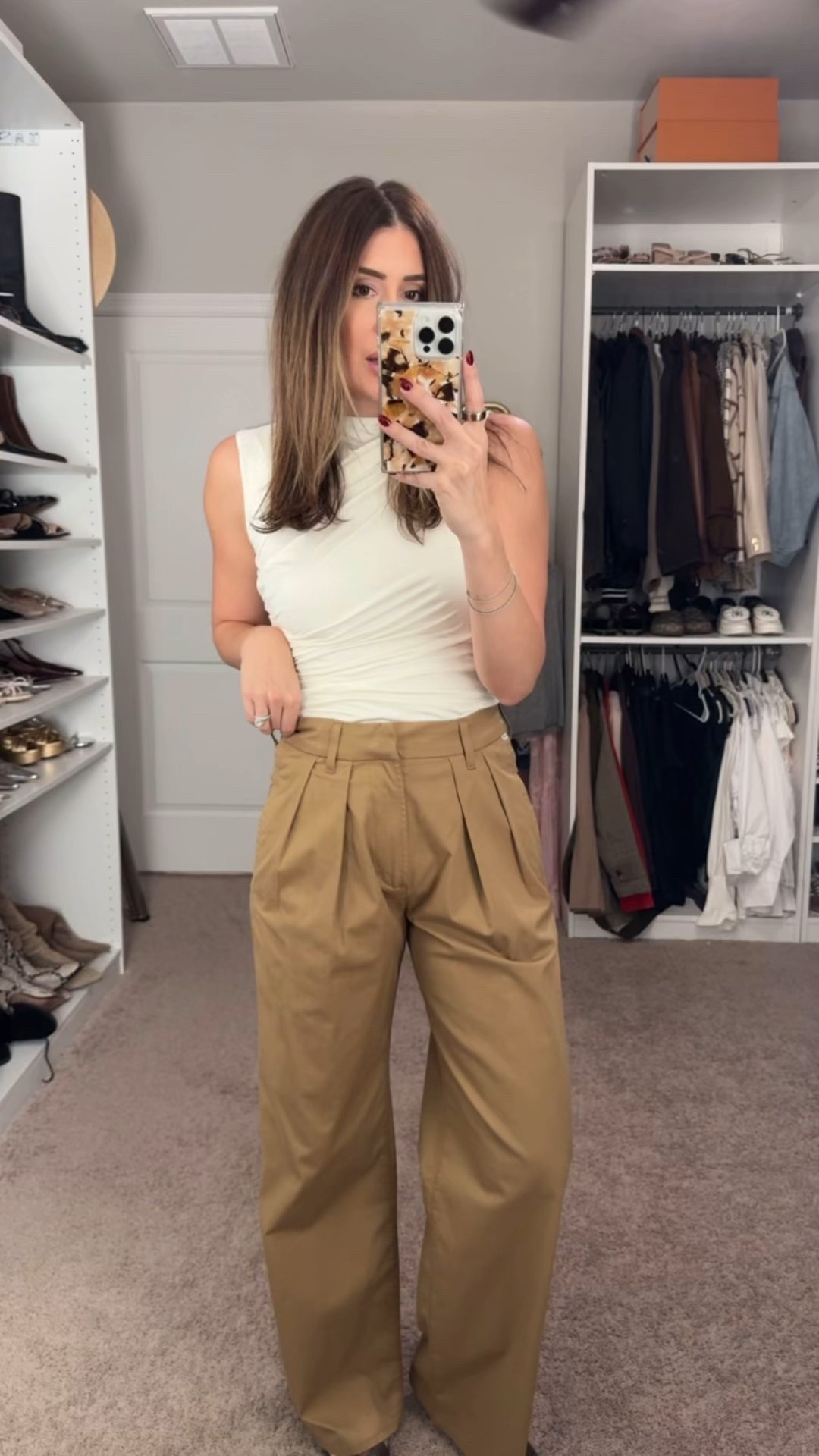 Small in top (size up for looser fit), size 25 in pants 