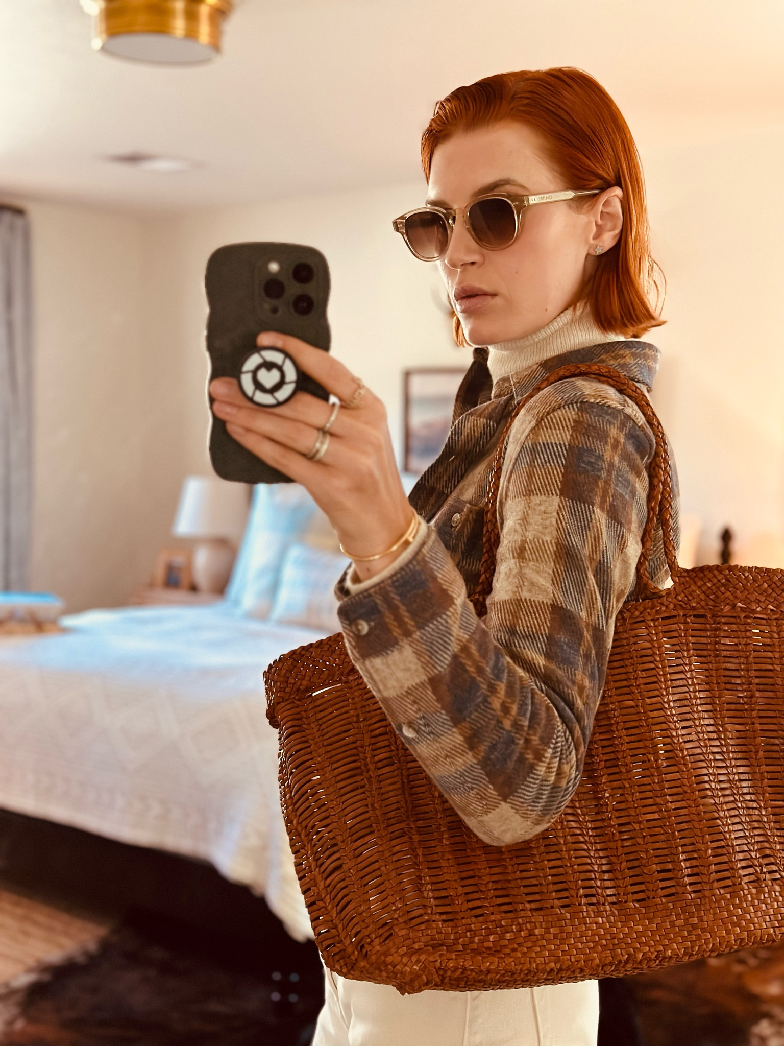 A closer look at my new brown leather woven tote bag. I have used by black one for more than a decade and never had a brown one. I’ve been wearing more of this tone lately and needed something for my laptop, kids snacks etc and this works well. I love the texture and beauty of the leather. It’s a year-round bag and a wardrobe builder 💥

#LTKitbag #LTKU #LTKtravel