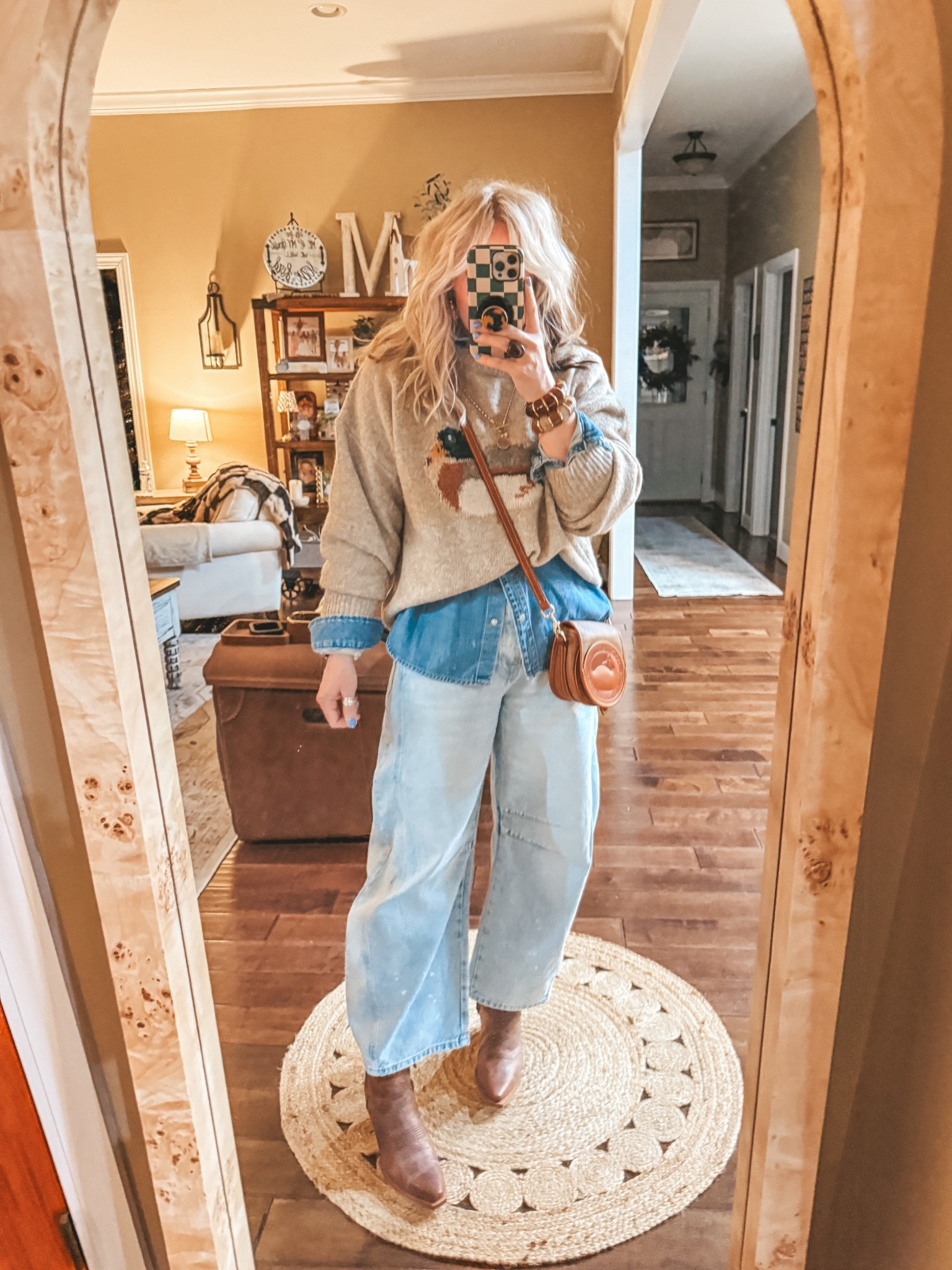 Saturday night fit 🦆
Sweater is @shopeverydaychic save with code MANDIE10 
Denim shirt underneath is a size medium 
Jeans I size down one 
Boots true to size 
Bracelets save with code MANDIE 

#LTKootd #LTKOver40 #LTKFindsUnder100