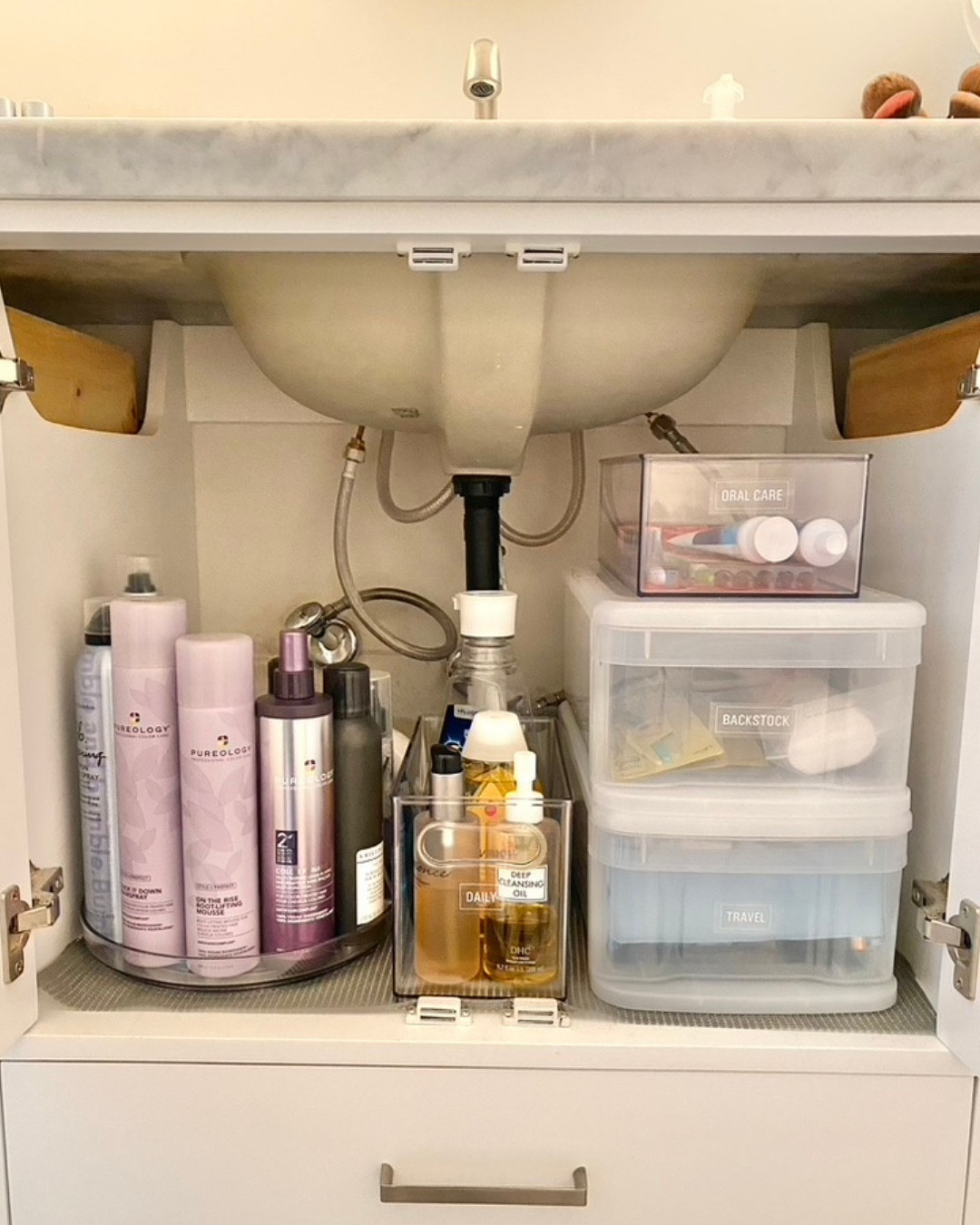 Let’s talk about under-sink cabinets for a second…

They’re usually: ❌ dark ❌ deep ❌ awkward ❌ full of random products & pipes

But they don’t have to stay that way...

Swipe to see some under-sink inspo and tips for what makes the biggest difference👇

✔️ Remove expired + unused products ✔️ Create clear categories & zones ✔️ Take advantage of vertical space with stackable storage ✔️ Choose strategic storage that works with the plumbing... not against it ✔️ Keep everyday items front and center, while overflow is contained & labeled in the back

Getting your under-sink cabinet organized is the 20 min project that can make all the difference in helping you quickly find what you need and streamline your daily routines!

🤔 Kitchen or bathroom... which one are you tackling first?!




#LTKmorningroutine #LTKFindsUnder50 #LTKHome