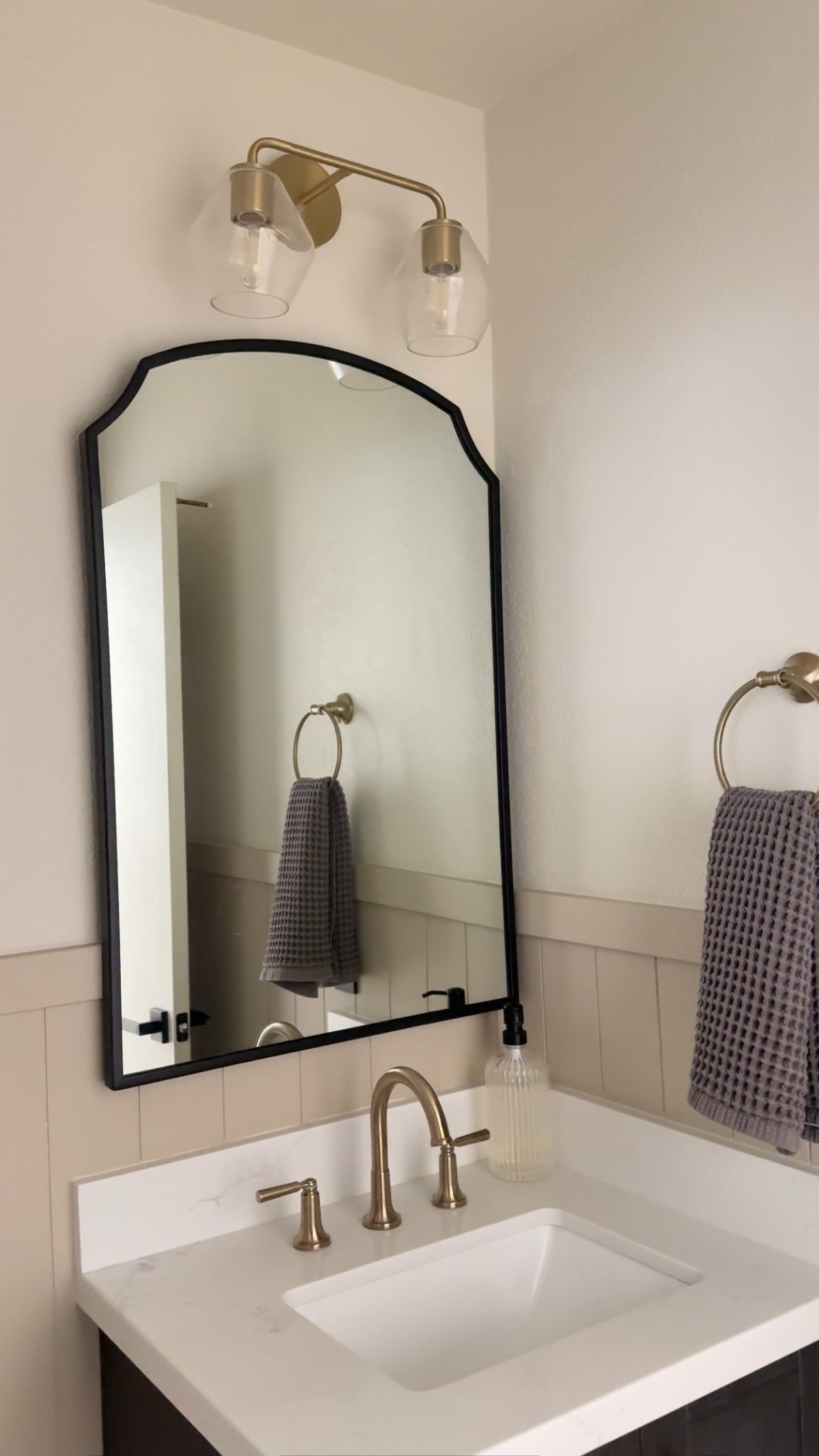 The bathroom vanity light that elevates the whole space. 

The AllModern Rooks 2-light in champagne bronze with clear glass globes is everything — warm, dimmable, and the perfect finishing touch for a neutral organic modern bathroom. This is one of those details that makes a bathroom feel intentional and designed rather than just functional. 

On sale now during Wayfair's Way Day event — up to 80% off with free shipping through April 27th only. Three days and it's gone. Shop through my link before deals end. #ad #WayDay #wayfair #wayfairpartner @Wayfair 

 #WayfairSale #ChampagneBronze #BathroomVanityLight #NeutralBathroom #OrganicModernBathroom #BathroomLighting 

#LTKSaleAlert #LTKHome