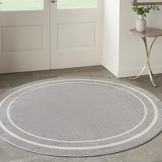Nourison Essentials 6' x Round Grey/Ivory Contemporary Indoor/Outdoor Rug | Amazon (US)
