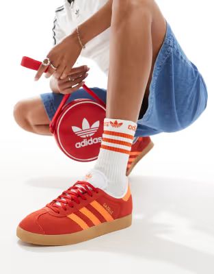 adidas Originals Gazelle trainers in red and orange with gum sole | ASOS (Global)