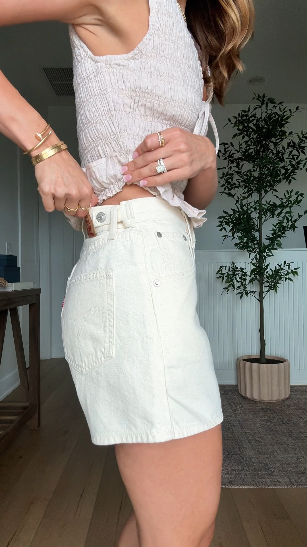 Everyday outfits. Summer outfits. Vacation outfits. Mom outfits. Denim shorts. Casual outfits. Elevated casual. Levi mid thigh cinch shorts in size 24, colors is ‘blank impact’. These have a 5” inseam. You can snap the sides to eliminate any waist-gap you might have. Shoes TTS. Smallest size in tops.

#LTKootd #LTKTravel #LTKgrwm