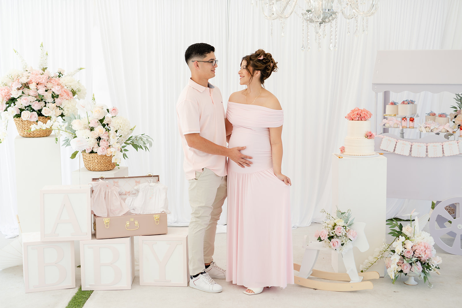Our stage was where we opened gifts, took family photos, and gathered throughout the celebration, so I wanted it to feel elegant without overwhelming the space.

We kept the design soft and timeless with flowing white draping, layered faux florals, custom bows, and personalized décor that complemented the rest of our Garden Rose theme. Instead of following every trend, we focused on a few thoughtful pieces that created a beautiful backdrop for the day.

I've linked the décor and similar pieces we used to create this look if you're planning your own baby shower or garden-inspired celebration.

Save this collection for baby shower inspiration you'll come back to while planning.

#LTKBaby #LTKBump #LTKKids
