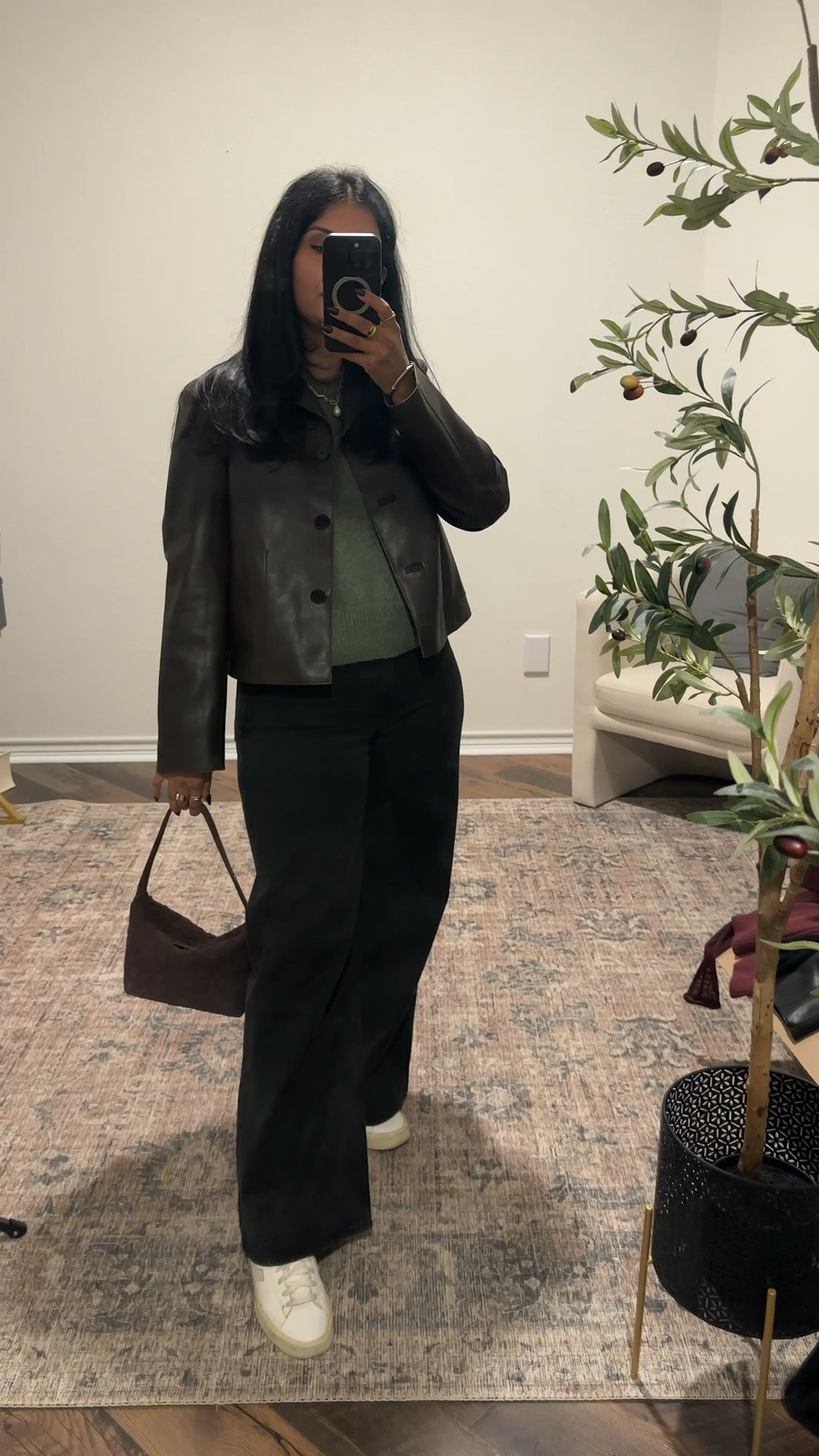 Wearing a medium in the jacket (tts), small in the sweater, size down 1, tts in the jeans and sneakers 