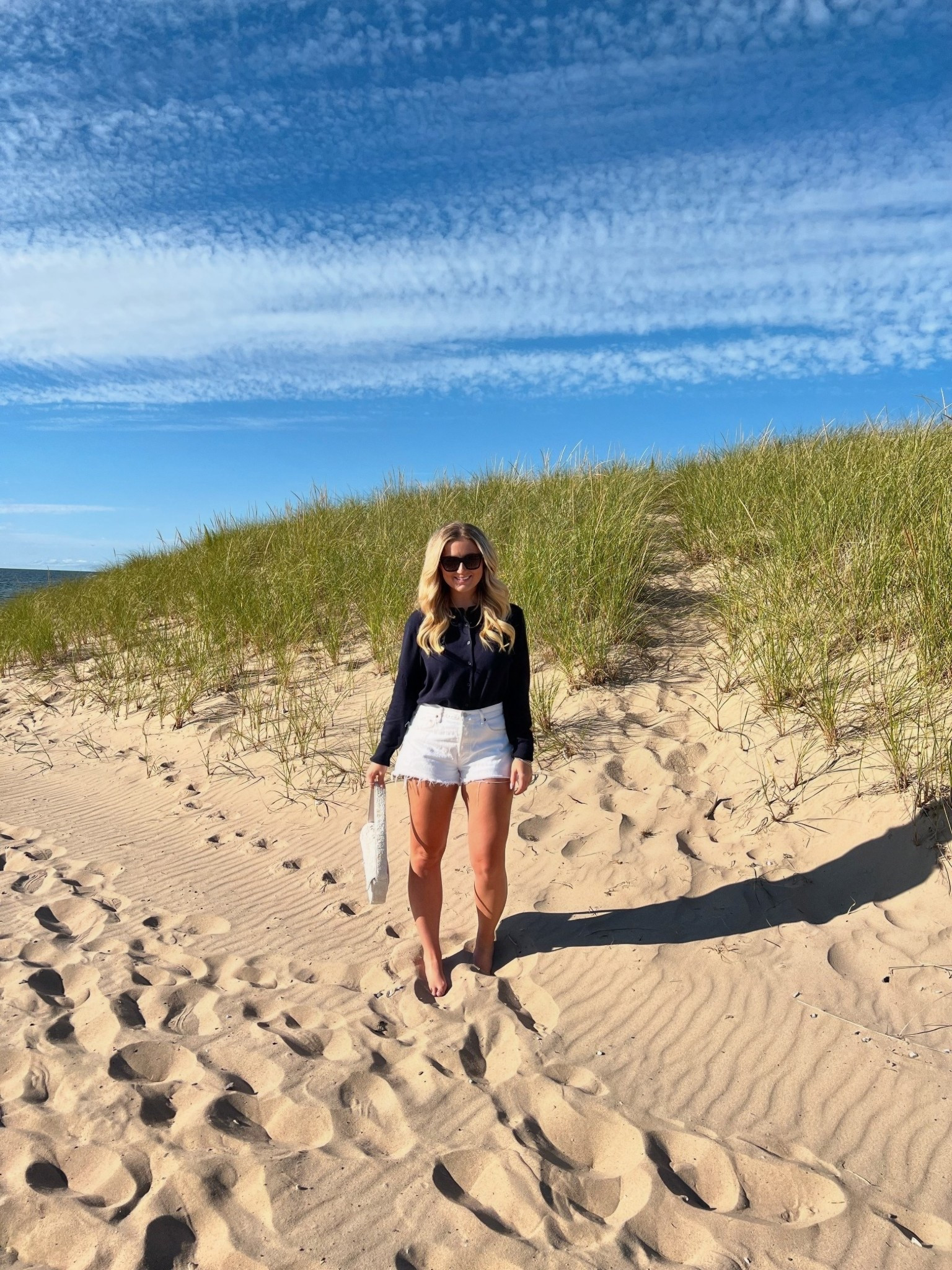 summer outfit, fall transitional outfit, denim shorts, lightweight sweater 

#LTKStyleTip #LTKSeasonal #LTKFindsUnder100