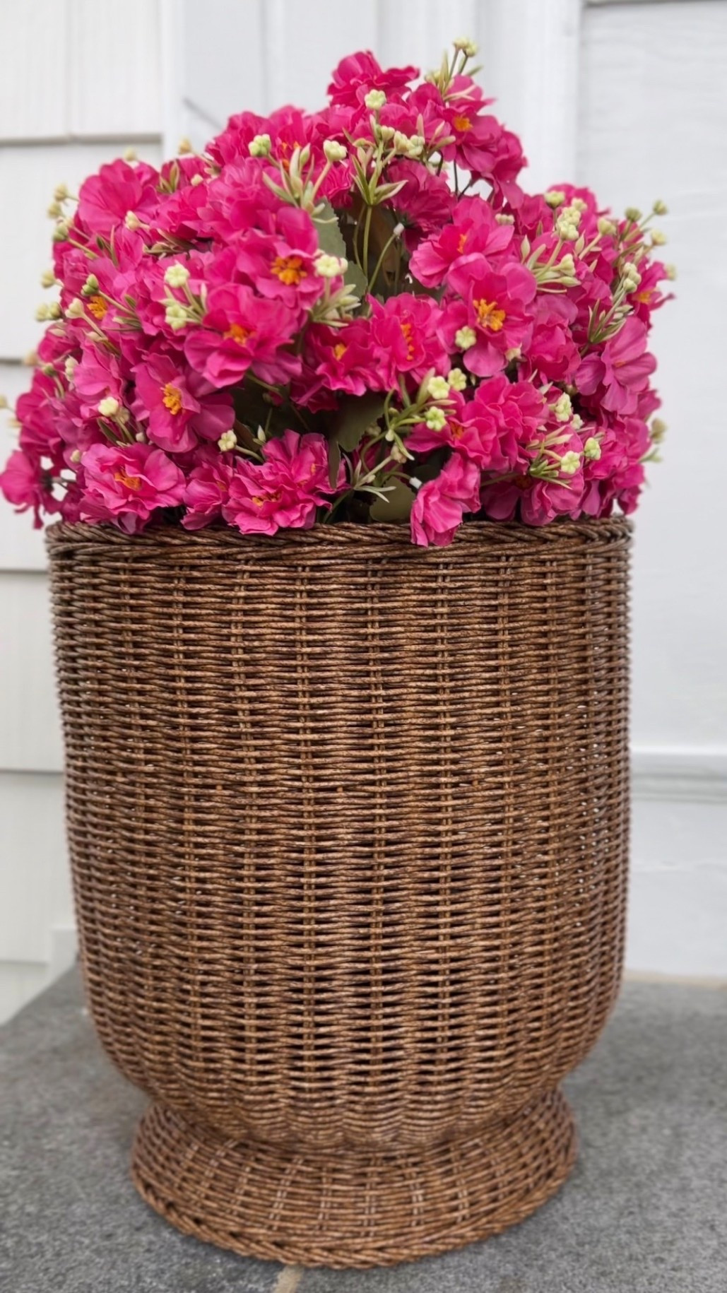 This rattan planter is giving designer vibes but doesn’t cost it! Perfect for your fall front porch with some pretty faux florals!

#LTKHome