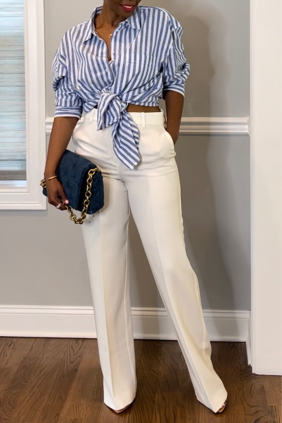 Striped button up and Ivory Wide Leg Pants. Wearing a Medium top and sz 6 pant. 

#LTKstyletip #LTKunder100 #LTKworkwear