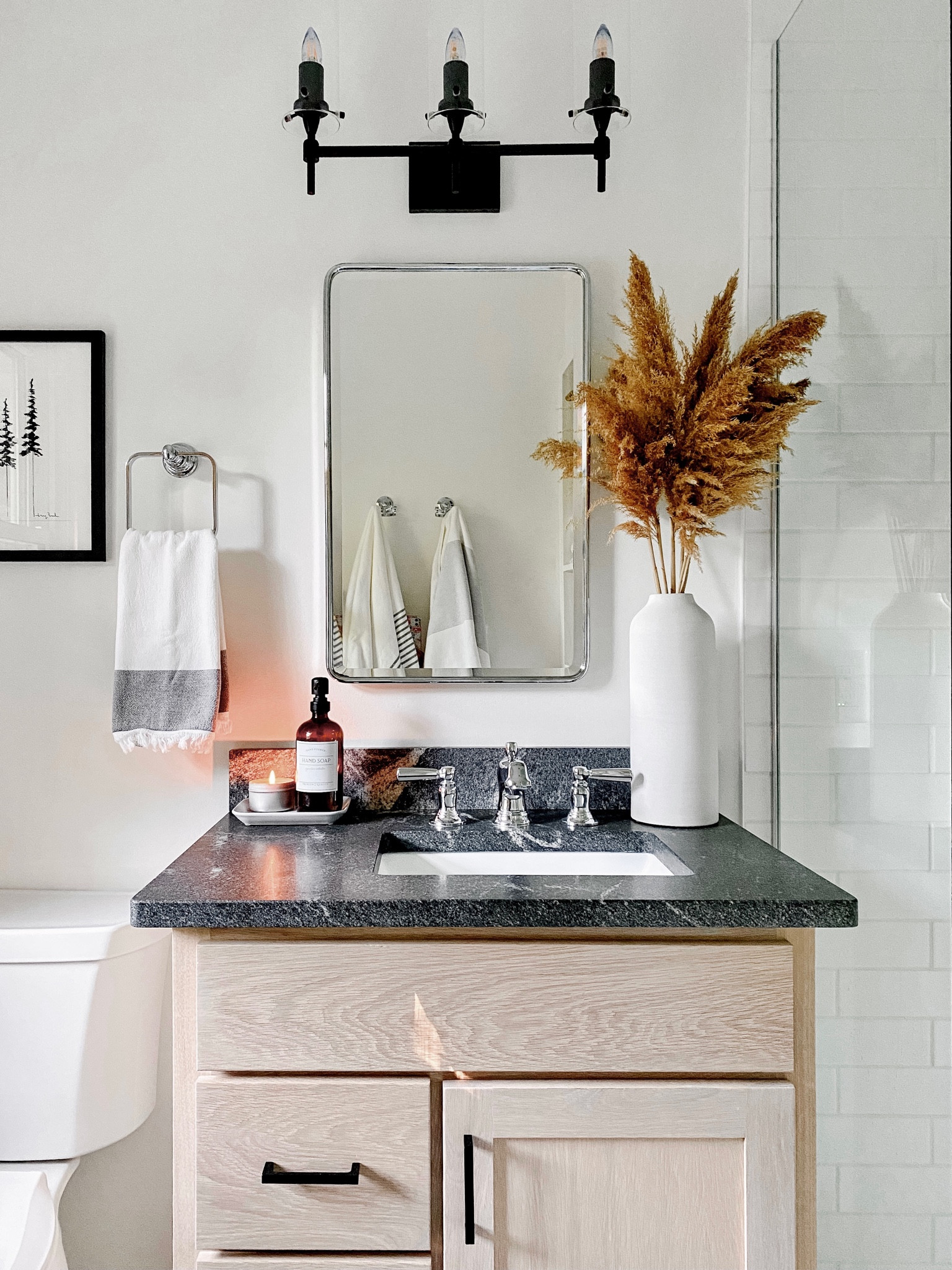White and black bathroom white oak vanity 

#LTKstyletip #LTKfamily #LTKhome
