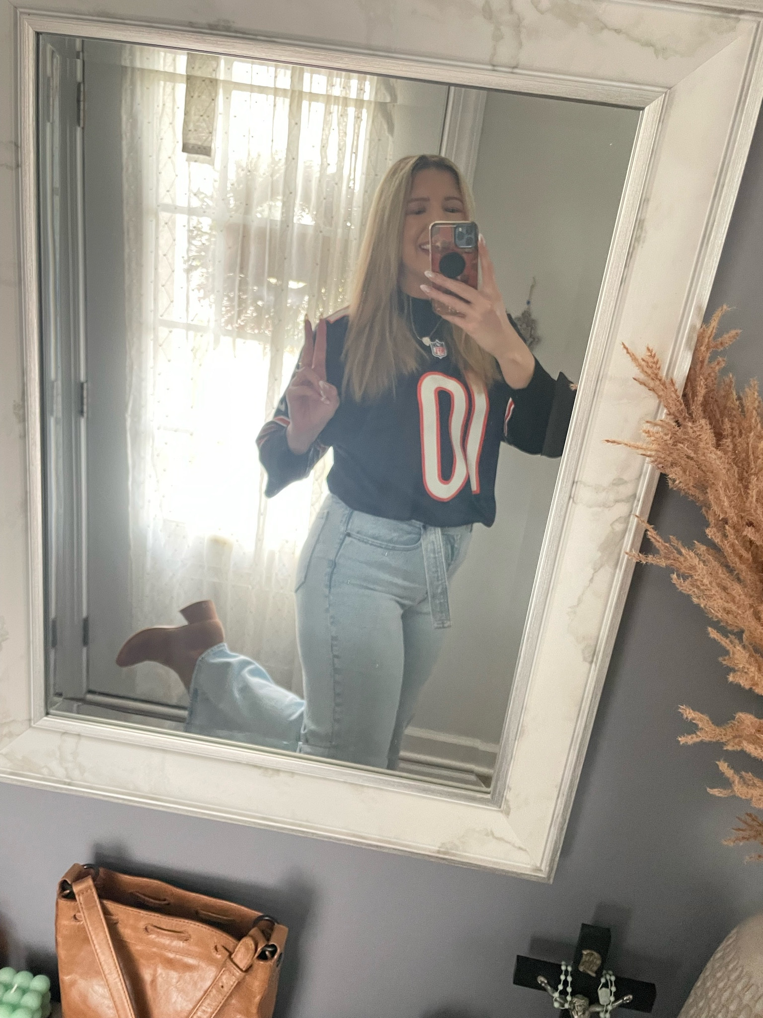 I’m so ready for football season and fall weather 🏈 
Size Large in jersey, size 10L in jeans, and 10 in booties. 

#LTKSeasonal #LTKBacktoSchool #LTKSale