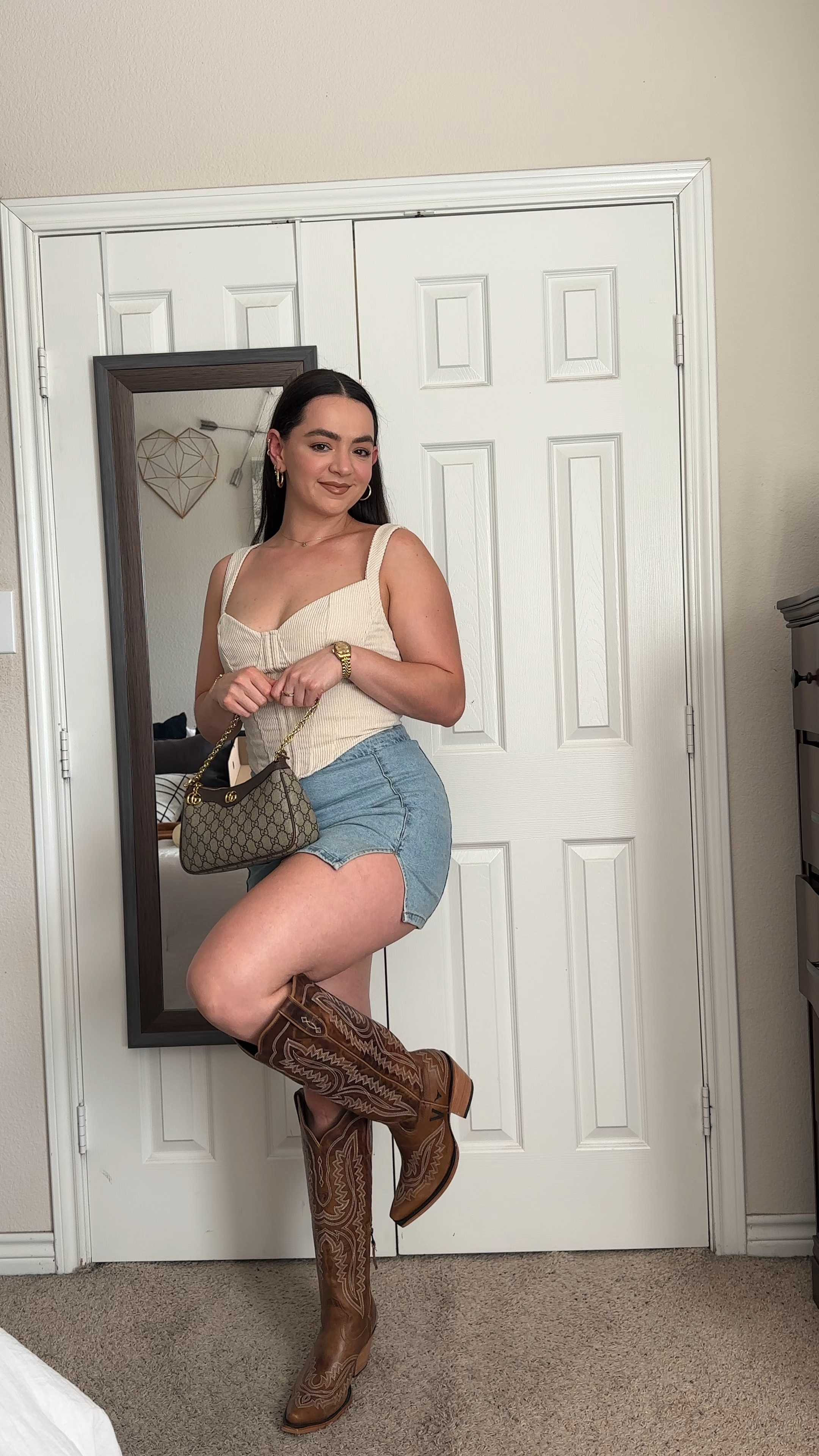 Cowgirl outfit. Cowboy outfit. Denim skirt. Rodeo outfit. Country concert outfit. Country girl style. Western style. Western outfit. Cowboy boots. Fort Worth stockyards. Cowgirl boots. Leather boots. Knee high boots. 

#LTKVideo #LTKItBag #LTKStyleTip