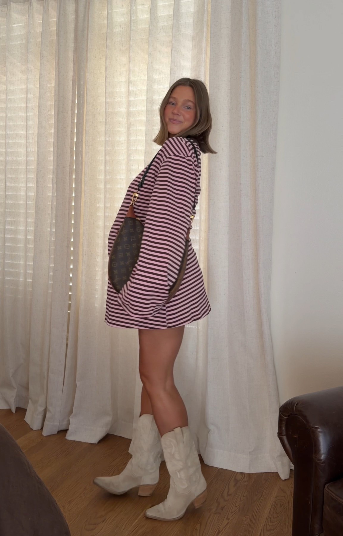 Dress size 10 I’m 5’ 5” and it’s such a perfect length!! If I wasn’t pregnant I would do an 8. Stick with true size. Boots true to size probably my most worn cowboy boots ever!! Amazon necklace for a pop of color 

#pregnancystyle #bumpstyle #stripeddress #bresheppard