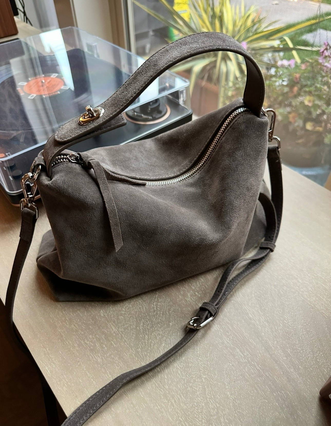 Genuine suede bag from Amazon. This is a good one. Great quality, lined, removable strap. And affordable