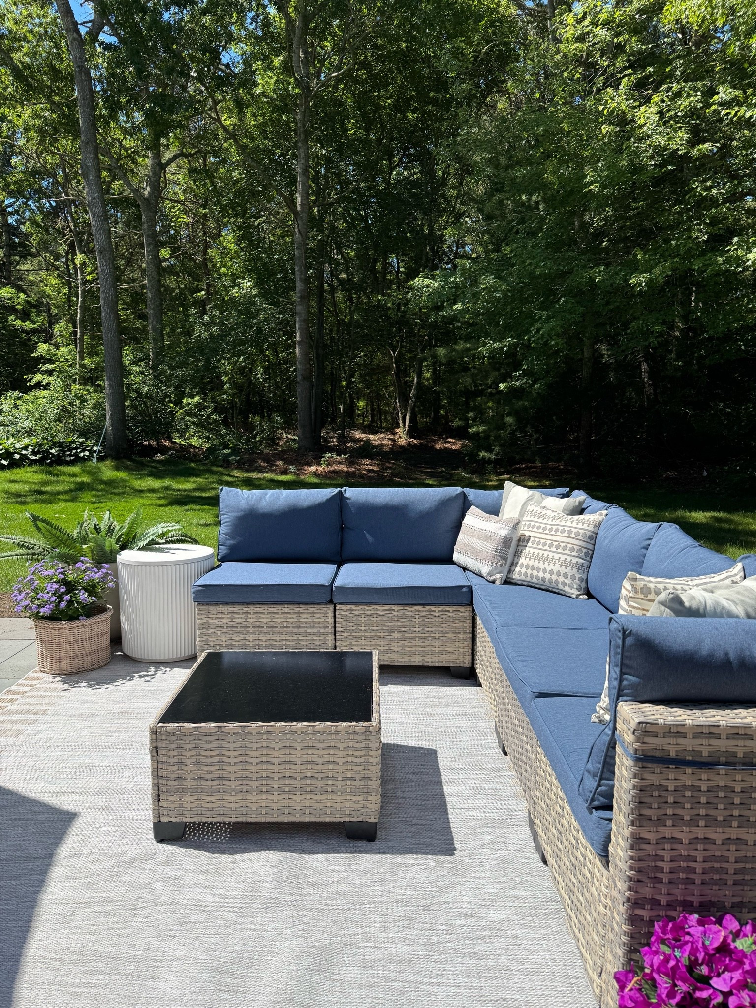 We’ve been spending as much time outside as possible lately, and this patio setup has become one of our favorite spots. 🌿 The sectional comes with a coffee table, the cushion covers are washable, and it’s available in multiple colors. Add a cooler side table, a cozy rug, planters, and a faux fern, and the space feels complete. ☀️✨

#ad
#wayfairpartner
#WayfairPicks
#wayfair
@wayfair 
#liketkit

#LTKHome #LTKSeasonal