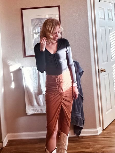 Ruched rust high slit skirt 
Long sleeve slinky hook - and - eye bodysuit (linked similar options) 

#LTKfindsunder50 #LTKfindsunder100 #LTKworkwear