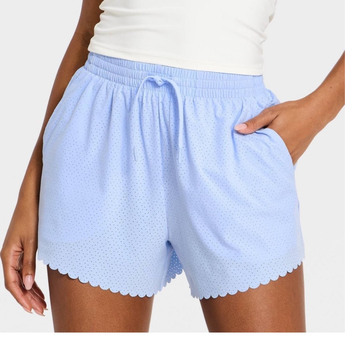 How cute are these scalloped perforated shorts?! Come in this blue color along with rose and black!