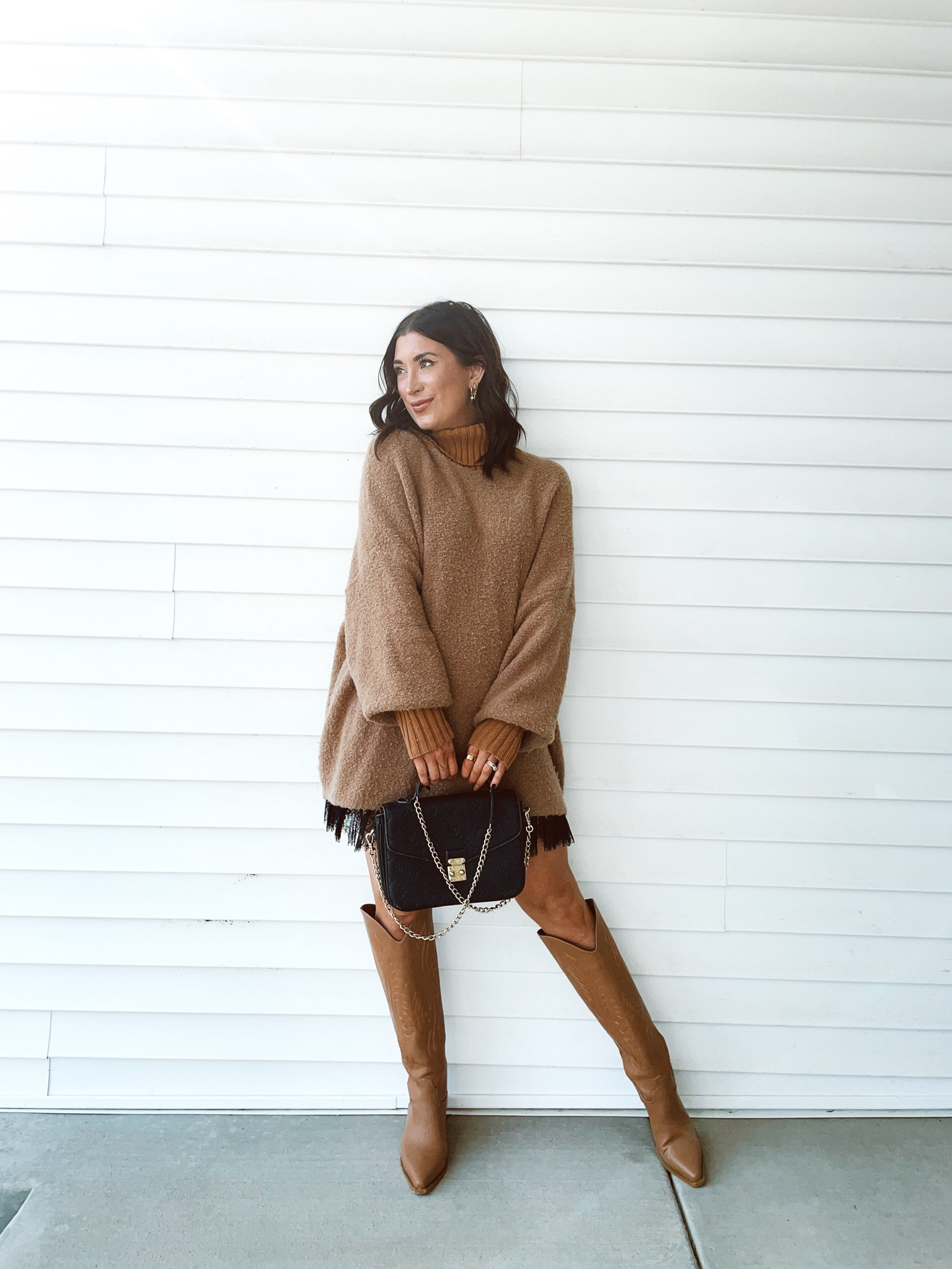 Love pairing a slip skirt with and oversized sweater for fall! The perfect elevated fall outfit! 

#LTKFindsUnder50 #LTKSeasonal #LTKStyleTip