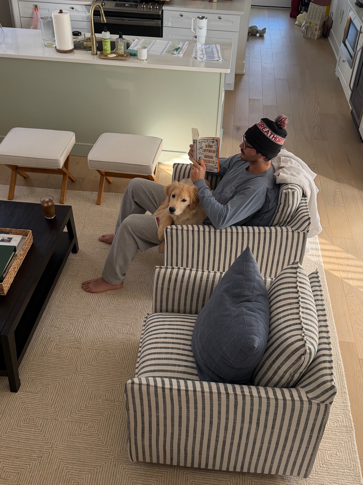 [1/26/26] the boys 💙 linking what I can + info in our living room: Couch is from sixpenny, Elias 84”, water Lilly, Polly fill Coffee table was purchased from a friend 10 years ago, west elm. Console frome HomeGoods! Tv: frame TV Pillows: plaid from this year & tree from last (both target) Ottoman stools: Amazon, they’re surprisingly comfortable!! Rug: just got from homesense! Unsure if we’ll keep, but it works as of now!!

#LTKHome #LTKSeasonal