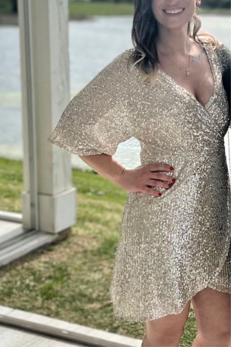 This silver sequin dress has long sleeves and is perfect for wedding guests or homecoming!
5’ and 115lbs
Size: Small

#LTKunder100 #LTKHoliday