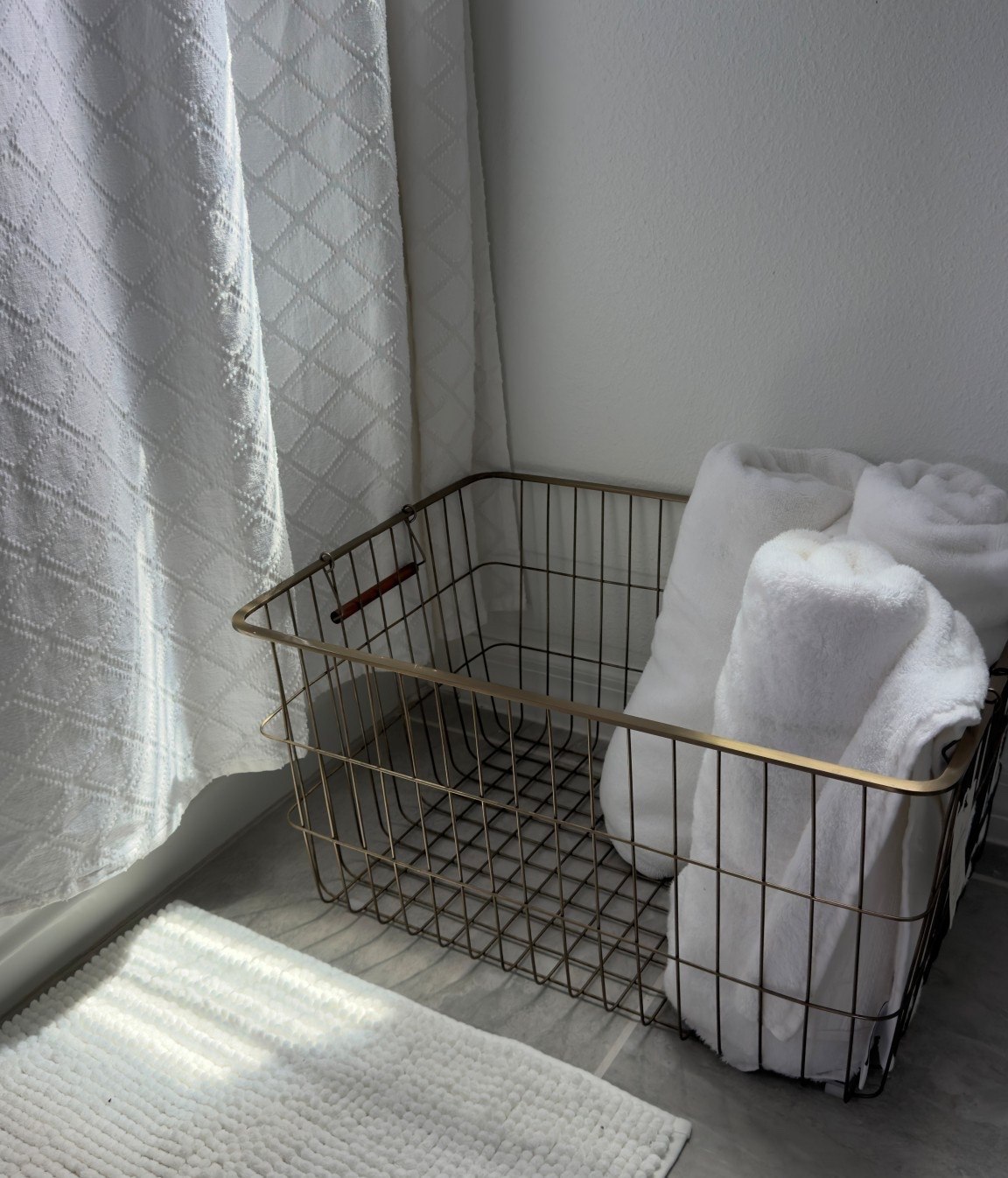 Brass basket for towels comes in small medium and large. This is the large one 

#LTKSaleAlert #LTKHome #LTKselfcare