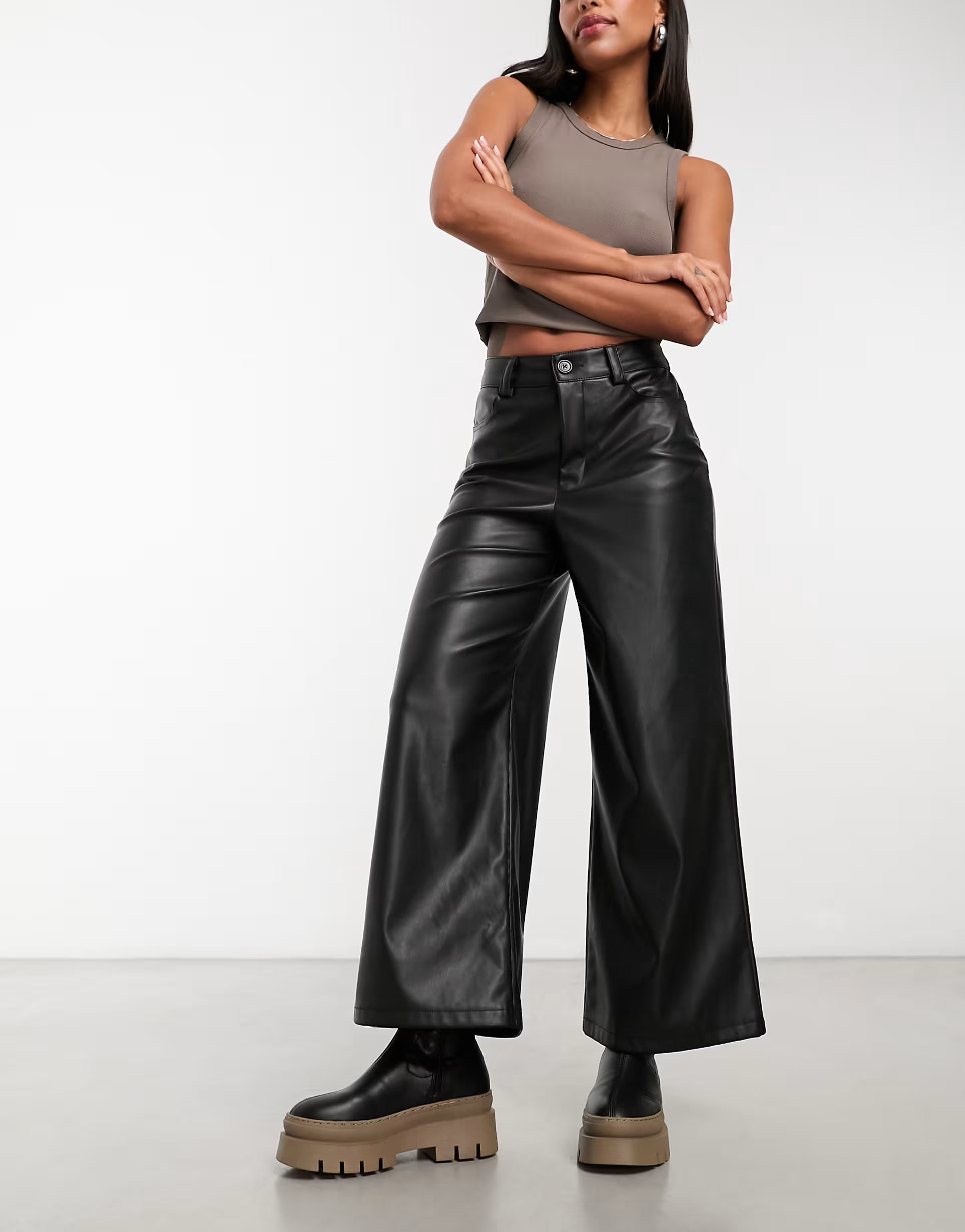 ASOS DESIGN faux leather wide leg pants in black | ASOS (Global)