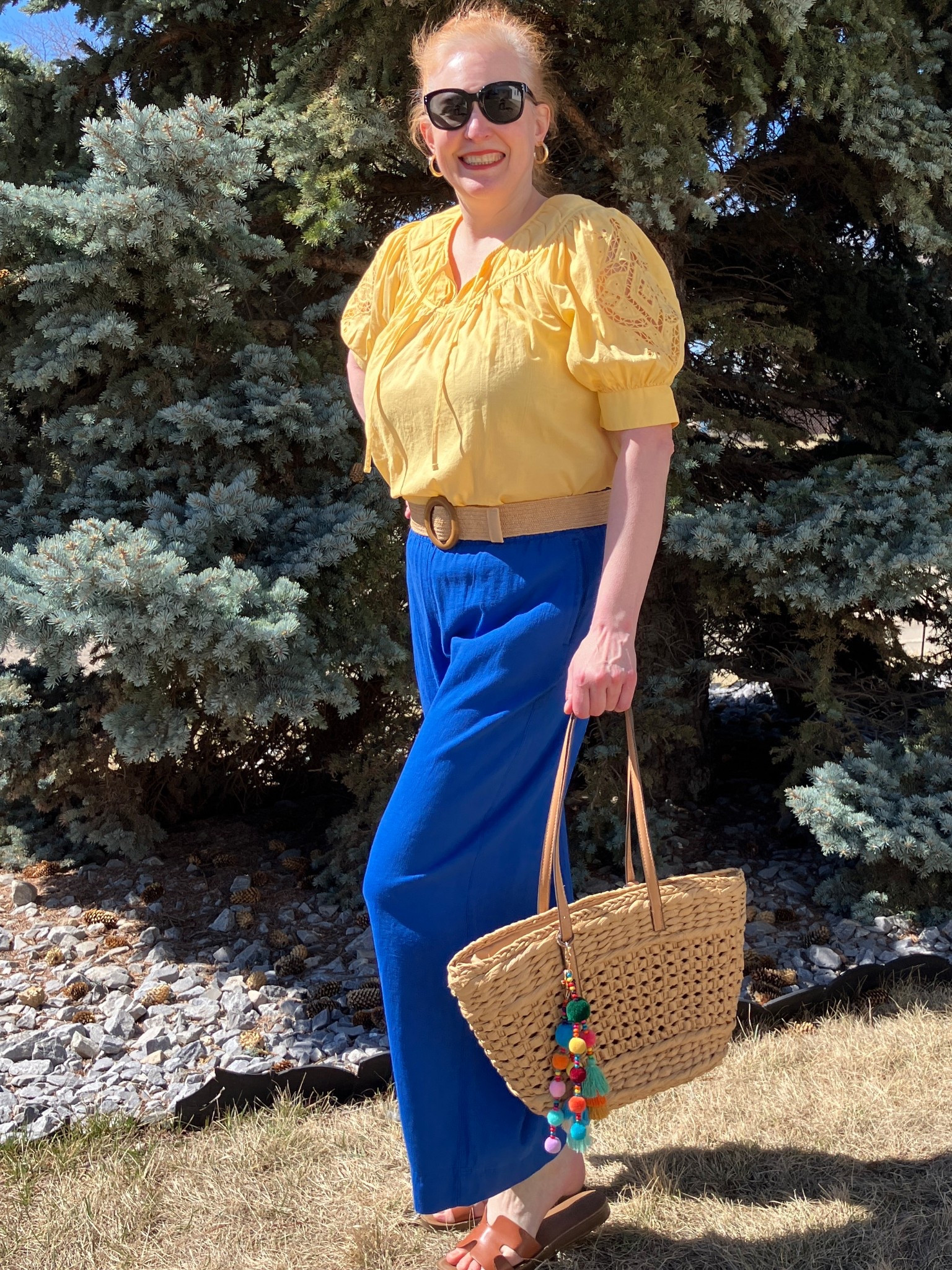 You won’t forget me when I’m gone in this bright outfit! I love bright colours together so I grabbed my yellow boho blouse and added my bright blue wide leg pants. For such a bold look I wanted to keep my shoes, belt,  and bag neutral except for my super colourful keychain charm. Looking so forward to the warmer days and greener grass! Canadians click on the first links to shop, and Americans click on the second links to shop. If there’s only one link then you can shop it in your own country. And remember, trendy doesn’t have to be expensive! Bye!

#LTKootd #LTKMidsize #LTKOver40