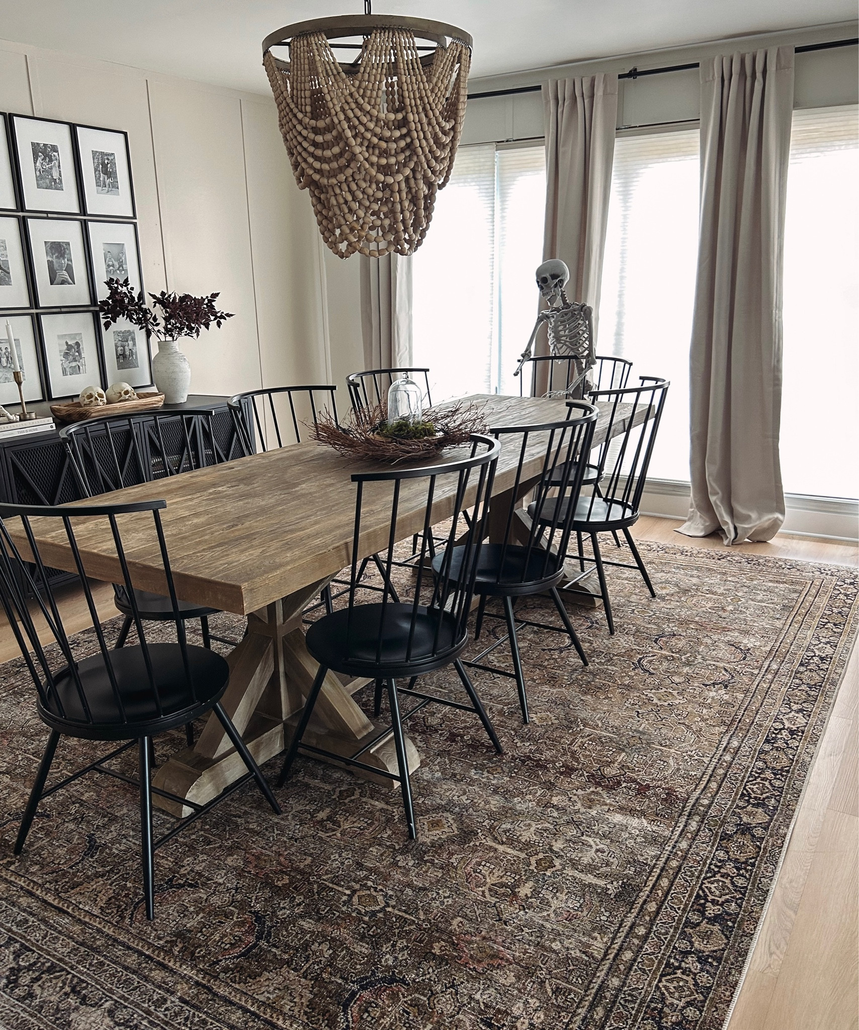 I love the warmth adding a rug to my dining room brought the space! My table is older from Restoration Hardware and my frames are Mixtiles. 

#LTKhome