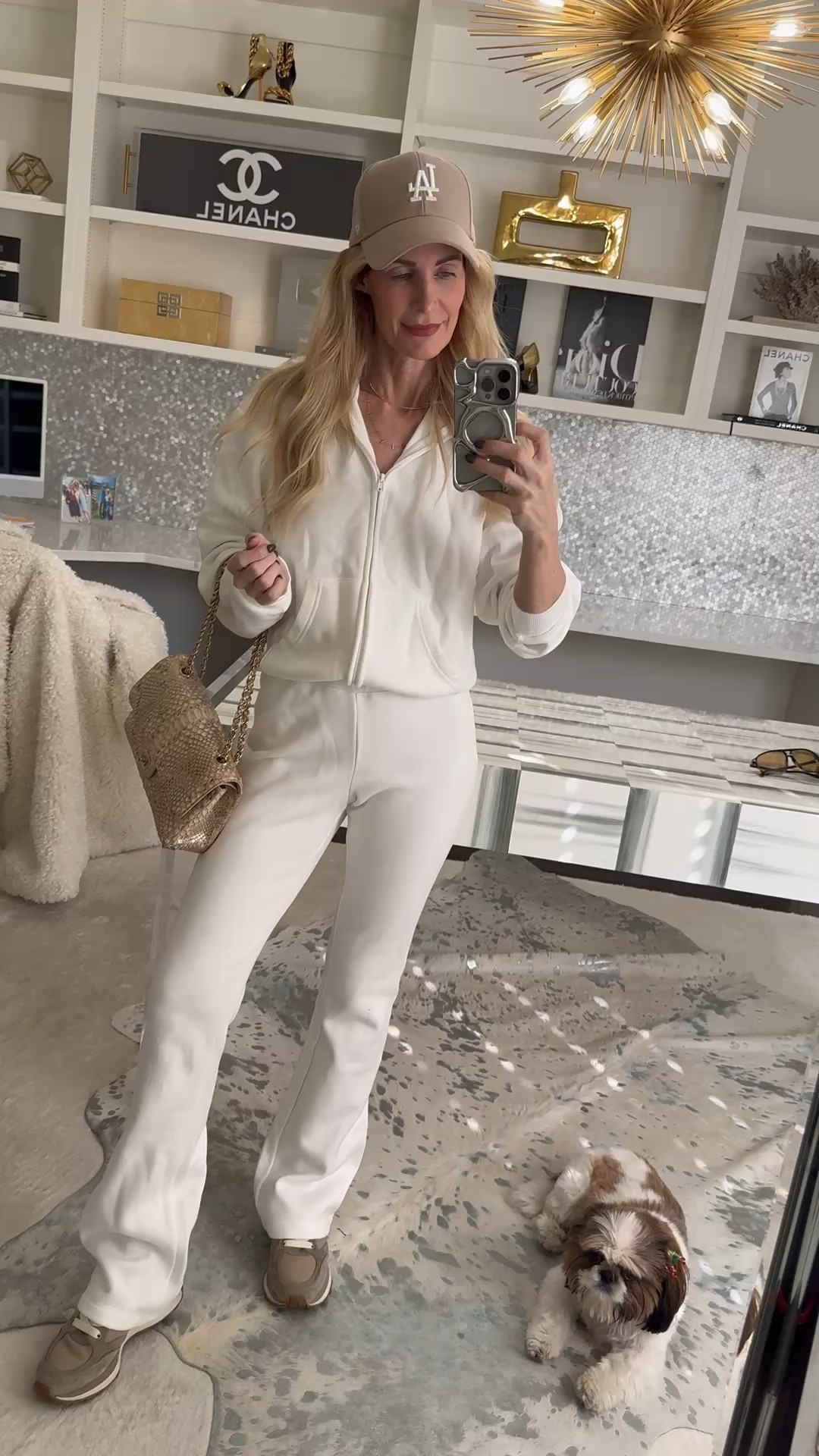 A great sweatsuit is all about fit, and this one absolutely delivers. This Skims set looks polished, feels incredibly comfortable, and works just as well for errands as it does for travel days or casual weekends. I’m wearing an XS in both the Skims sweatpants and jacket, and the fit is relaxed but still flattering. 

 #LTKootd #LTKActive #LTKOver40