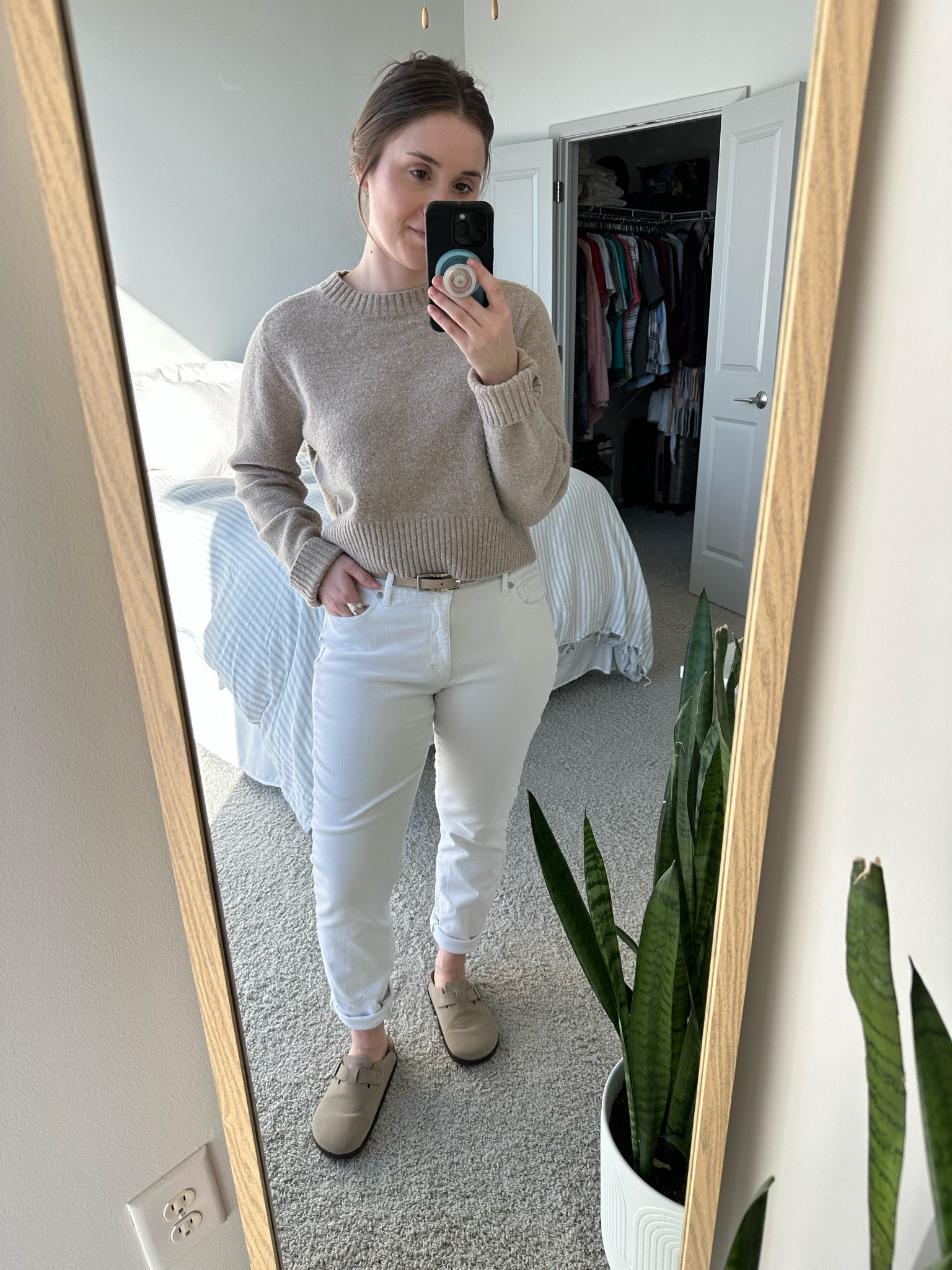 Outfit formulas make getting dressed easier. My favorite is a color sandwich. Wearing a tan sweater with white jeans and tan clog shoes  

#LTKstyletip