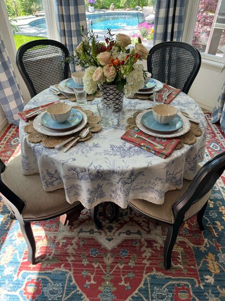 Beautiful and colorful area rug, gingham curtains, buffalo check drapes and panels, French country tablecloth, cane dining chairs, breakfast nook inspo and decor ideas

#LTKfindsunder50 #LTKhome #LTKSeasonal