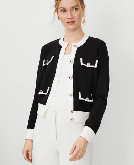 Dual colored black and white cardigan with gold button details. Chic workwear for corporate outfits or business conference events. Currently on sale 25% off!

#LTKsalealert #LTKworkwear #LTKSpringSale