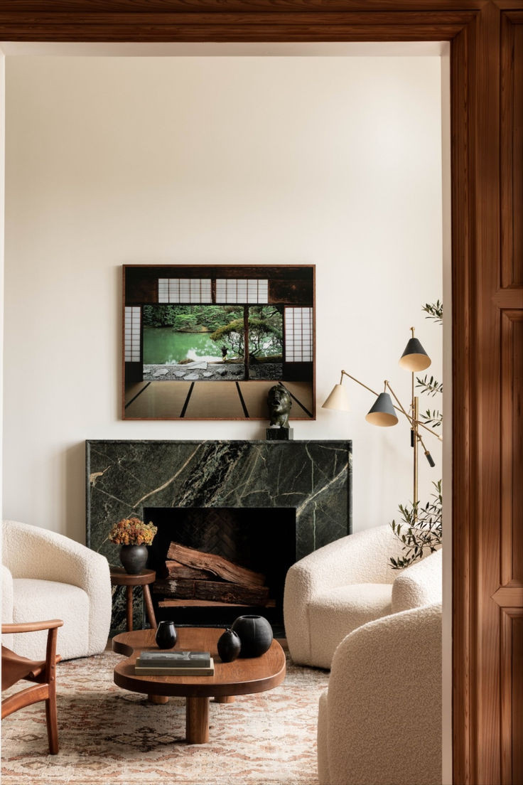 Serene Living Room Design with Green Marble Fireplace

#LTKcasa