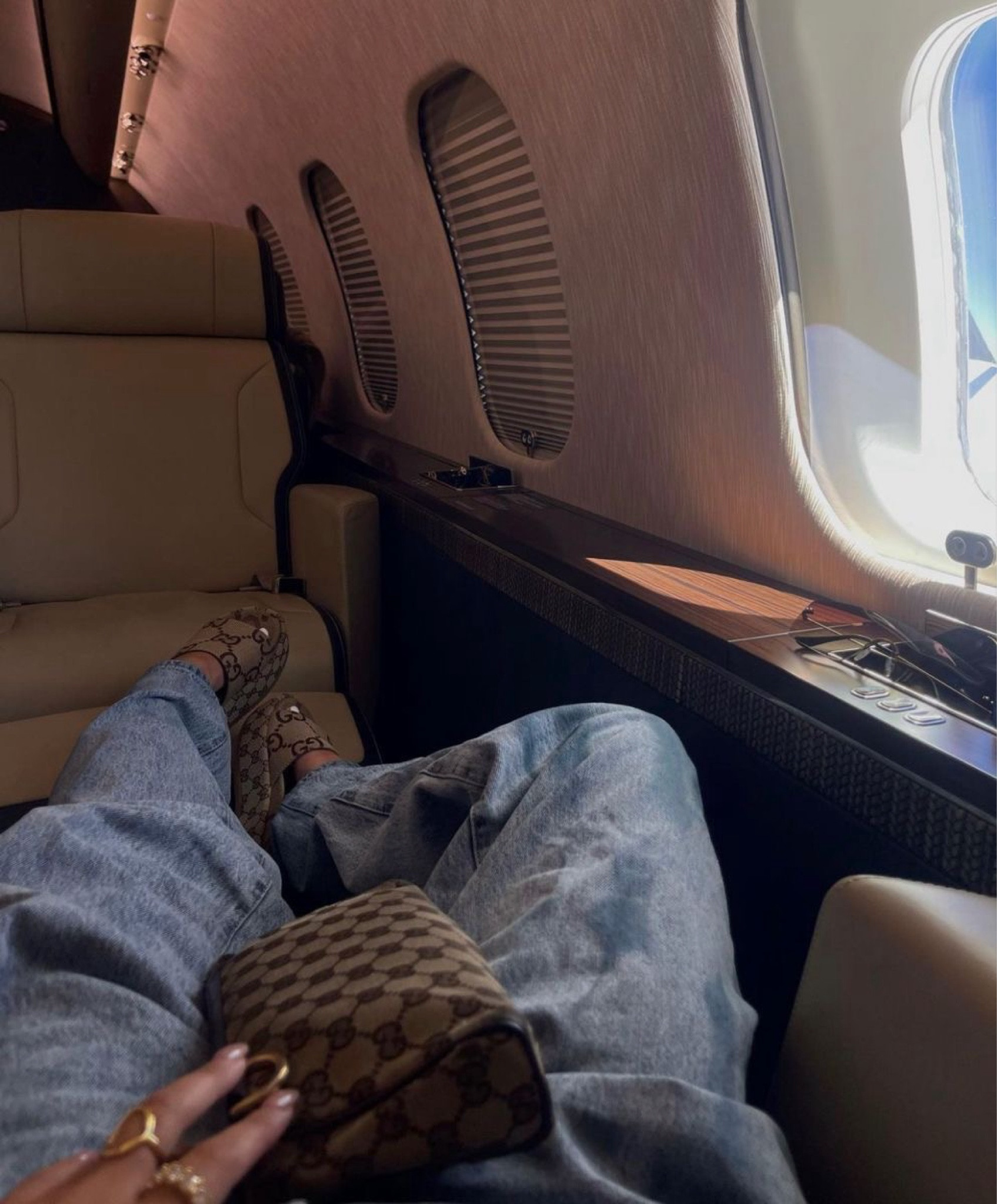 Embracing the high life at 35,000 feet with my go-to Gucci sandals and perfectly paired bag. There's nothing like the comfort and elegance of luxury accessories while jet-setting. ✈️✨ #LuxuryTravel #GucciStyle #JetSetLife #TravelEssentials #FashionOnTheGo

#LTKTravel #LTKShoeCrush #LTKItBag