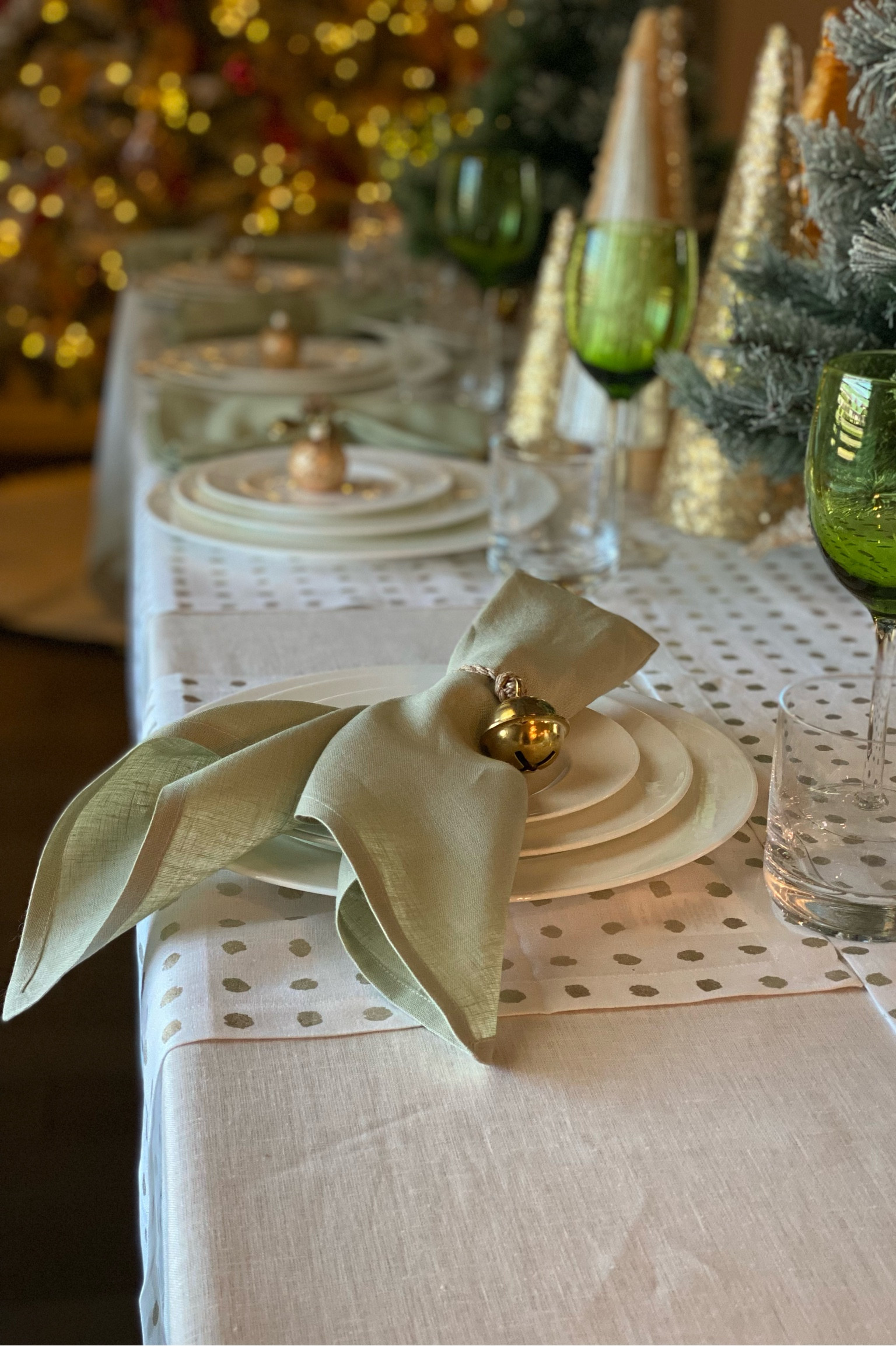 Christmas Table. Dinner Table. Setting table. Napkins. Ring napkins. Green decorations. Christmas green decorations. 

#LTKHoliday #LTKfindsunder50 #LTKhome