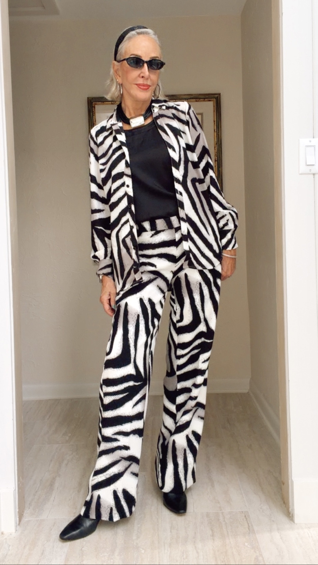 Discover the perfect balance between comfort and class with our Zebra Animal Print Crepe Pull-On Pants and button front shirt. Featuring front pockets, back welt pockets, ready-to-wear pull-on waistband, and a hook and bar zip front closure.
Jersey tank is like silk but so much better

#LTKOver40 #LTKgrwm #LTKootd