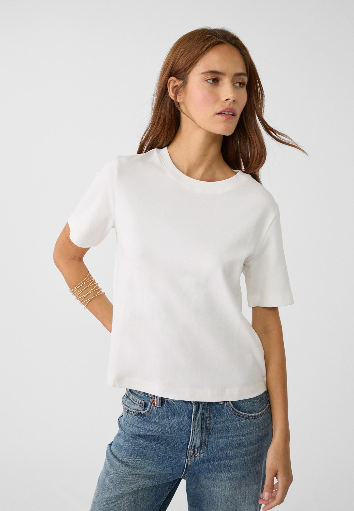 T-shirt with a round neck and short sleeves. Available in assorted colours. Made of cotton.View m... | Stradivarius (UK)