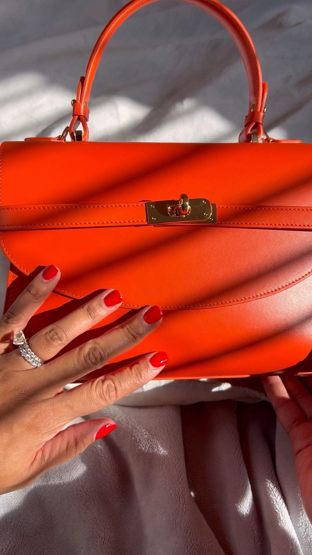 A classic style bag in orange 

#LTKitbag #LTKSeasonal #LTKworkwear