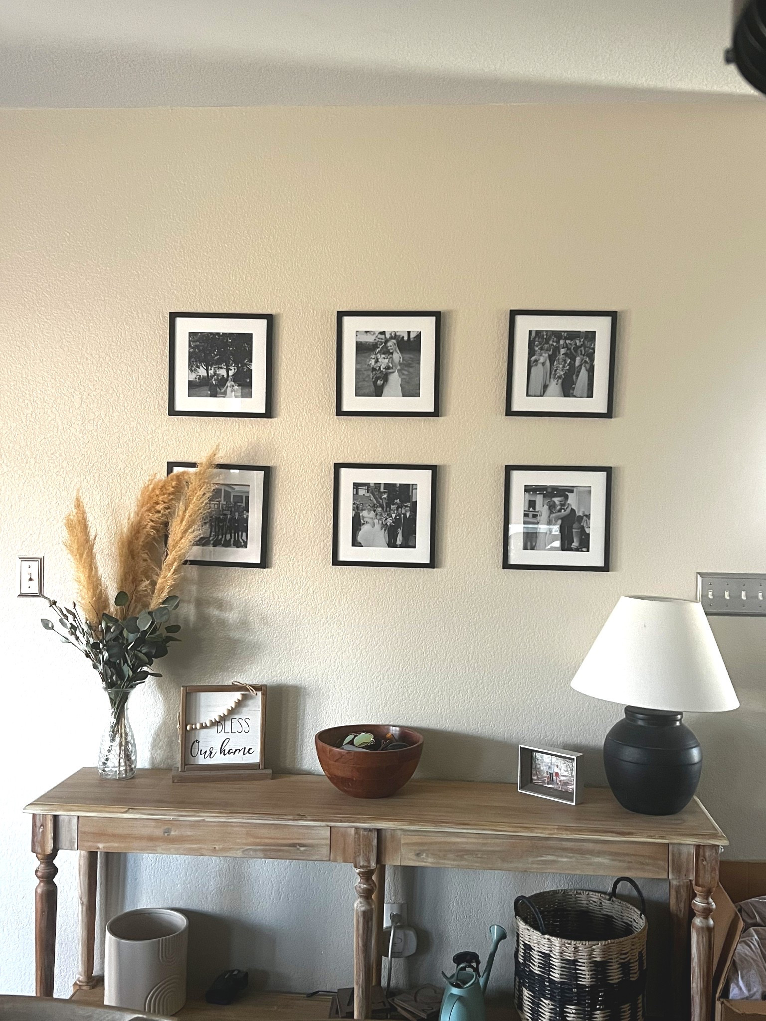 Console table and gallery wall in our entry way/kitchen area! 

My plan is to add another row of photos and use bigger frames. These are 10x10 and a few years old from target! 

#LTKFamily #LTKHome #LTKStyleTip