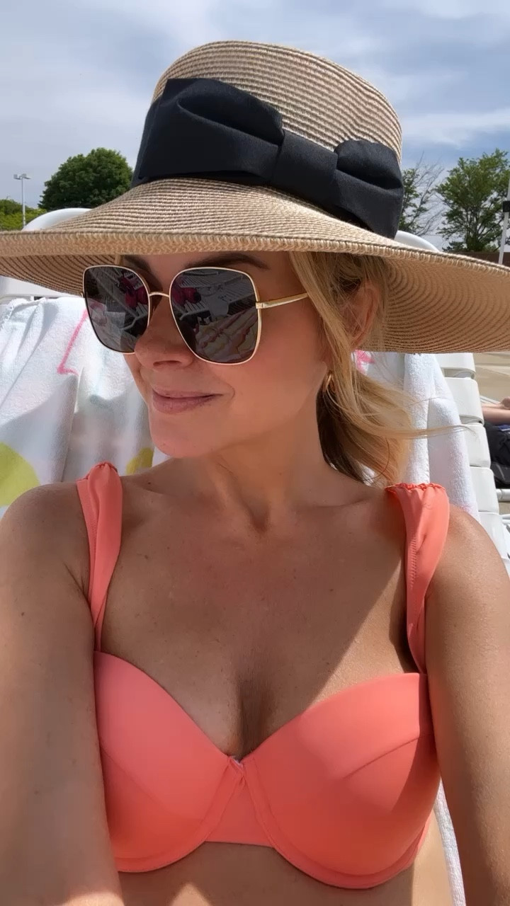 Me avoiding sun on my face as much as humanly possible this year! Floppy hats all day!