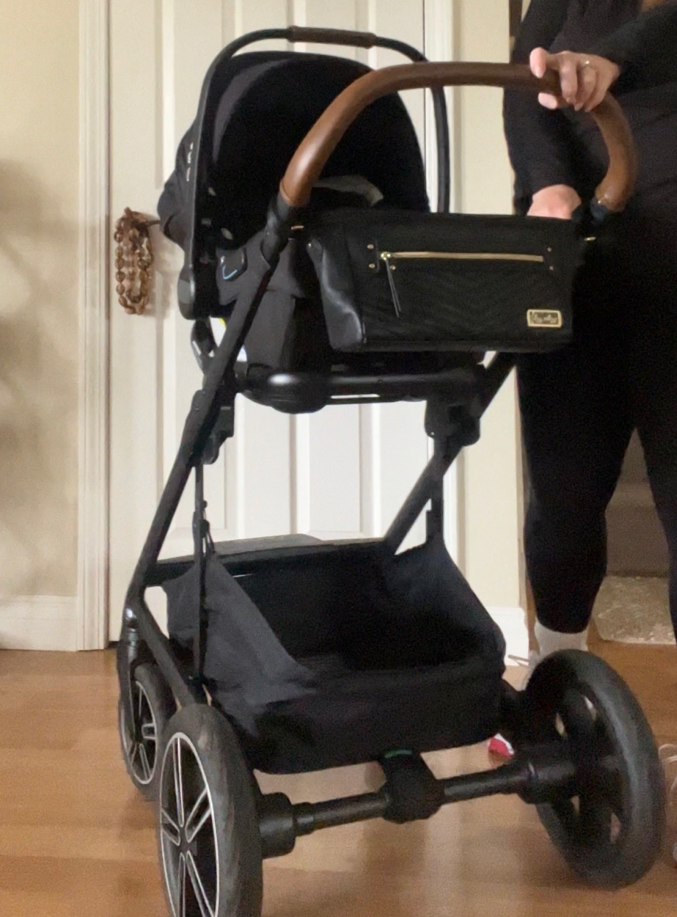 My stroller caddy!!! It’s perfect for your phone, keys, water, diapers. You name it!

#LTKkids #LTKbaby #LTKbump