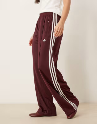 adidas Originals Firebird Loose track pants in burgundy | ASOS (Global)