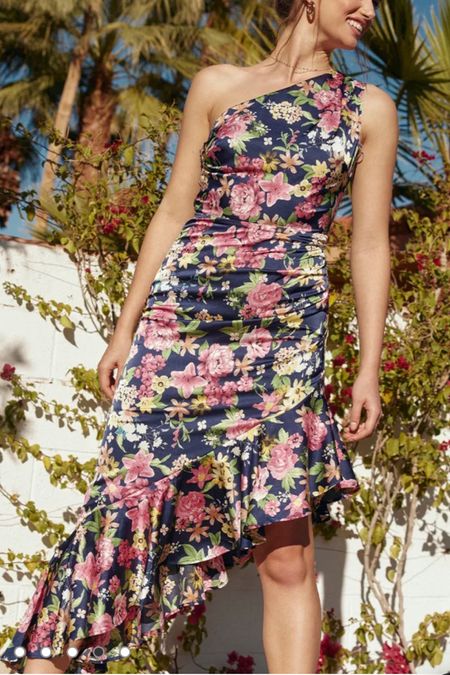 This floral midi dress is perfect for a spring wedding guest dress or a summer wedding guest outfit!

#LTKunder100 #LTKwedding