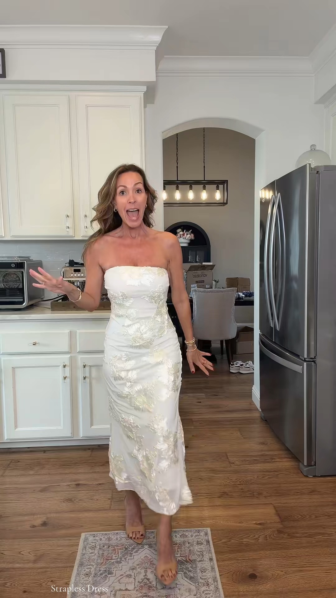 5’3” 110 lbs wearing size small. Color: apricot. Obsessed with this dress! 

 #straplessdress #weddingguestdress #dress