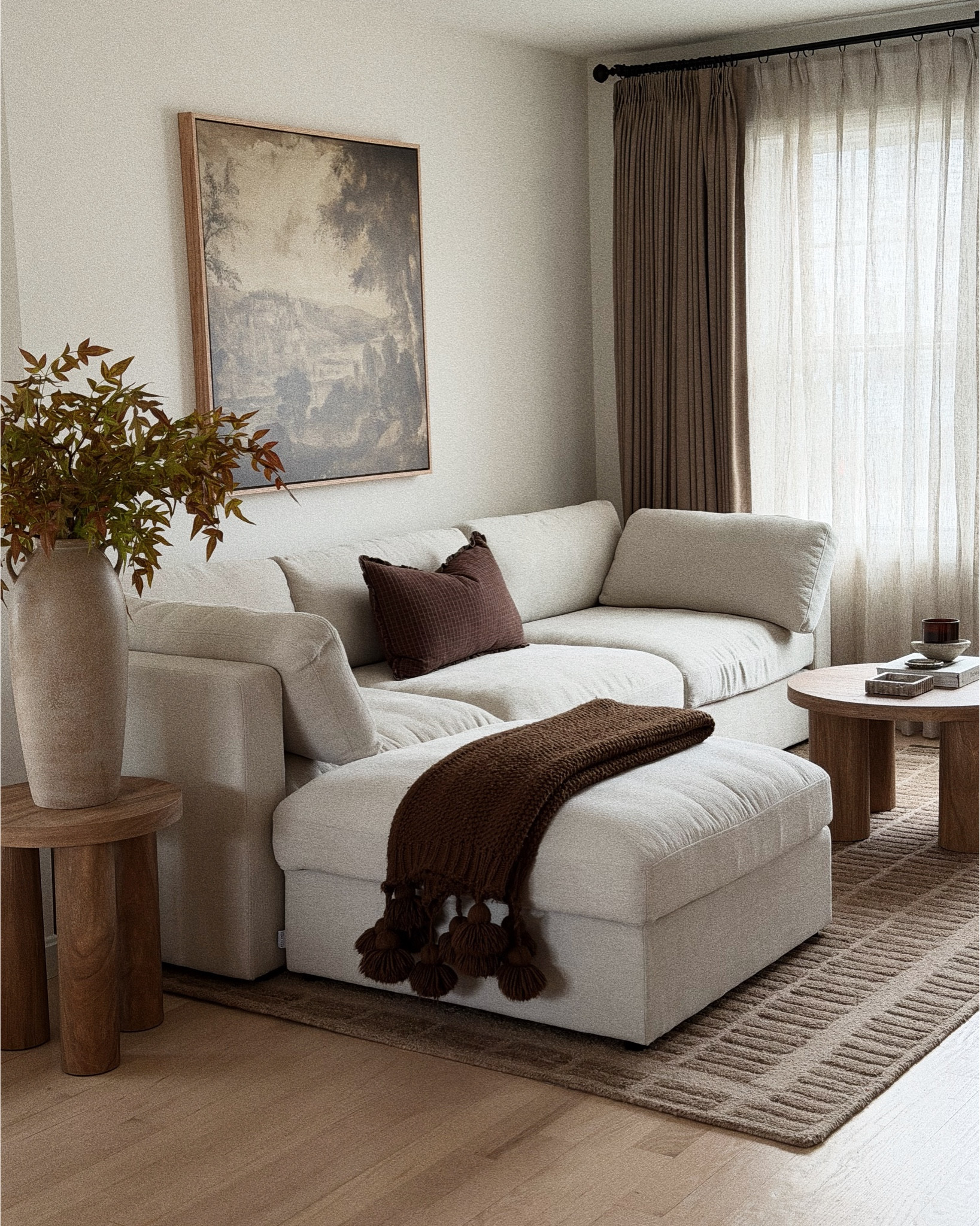 cozy living room inspiration, neutral living room 

my couch is up to 60% off for black friday sale! 
@bellamiacollections
.
.
.
brown loloi rug
linen sofa 
brown curtains 
@afloral
@loloirugs
@twopageshome

#LTKGiftGuide #LTKSaleAlert #LTKHome