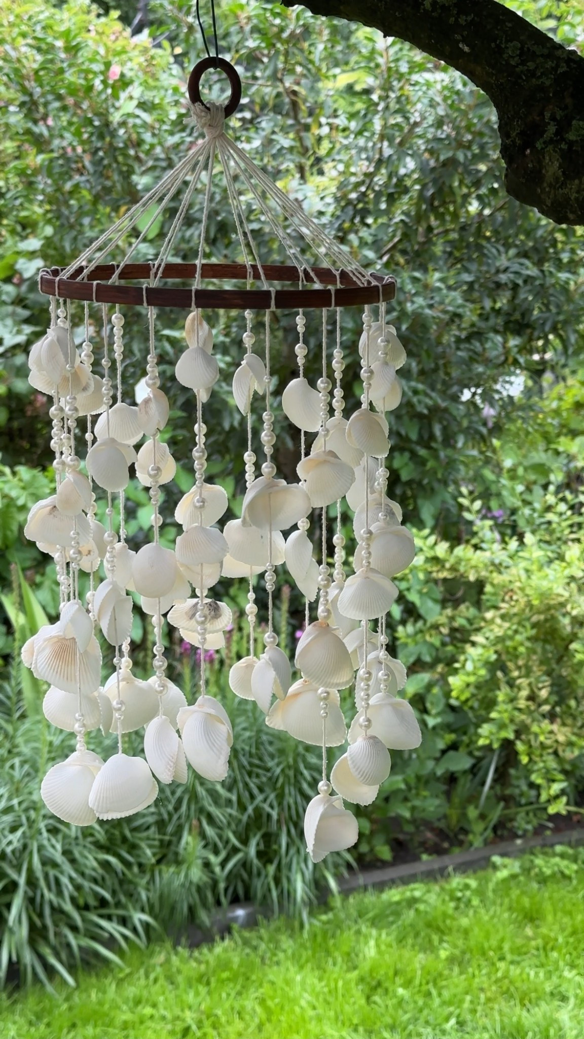Muschel Windspiel 

#LTKsummer #LTKstyletip #LTKhome