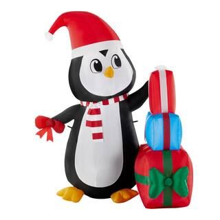Home Accents Holiday 5 ft Pre-Lit LED Airblown Penguin with Gift Stack Scene Christmas Inflatable... | The Home Depot